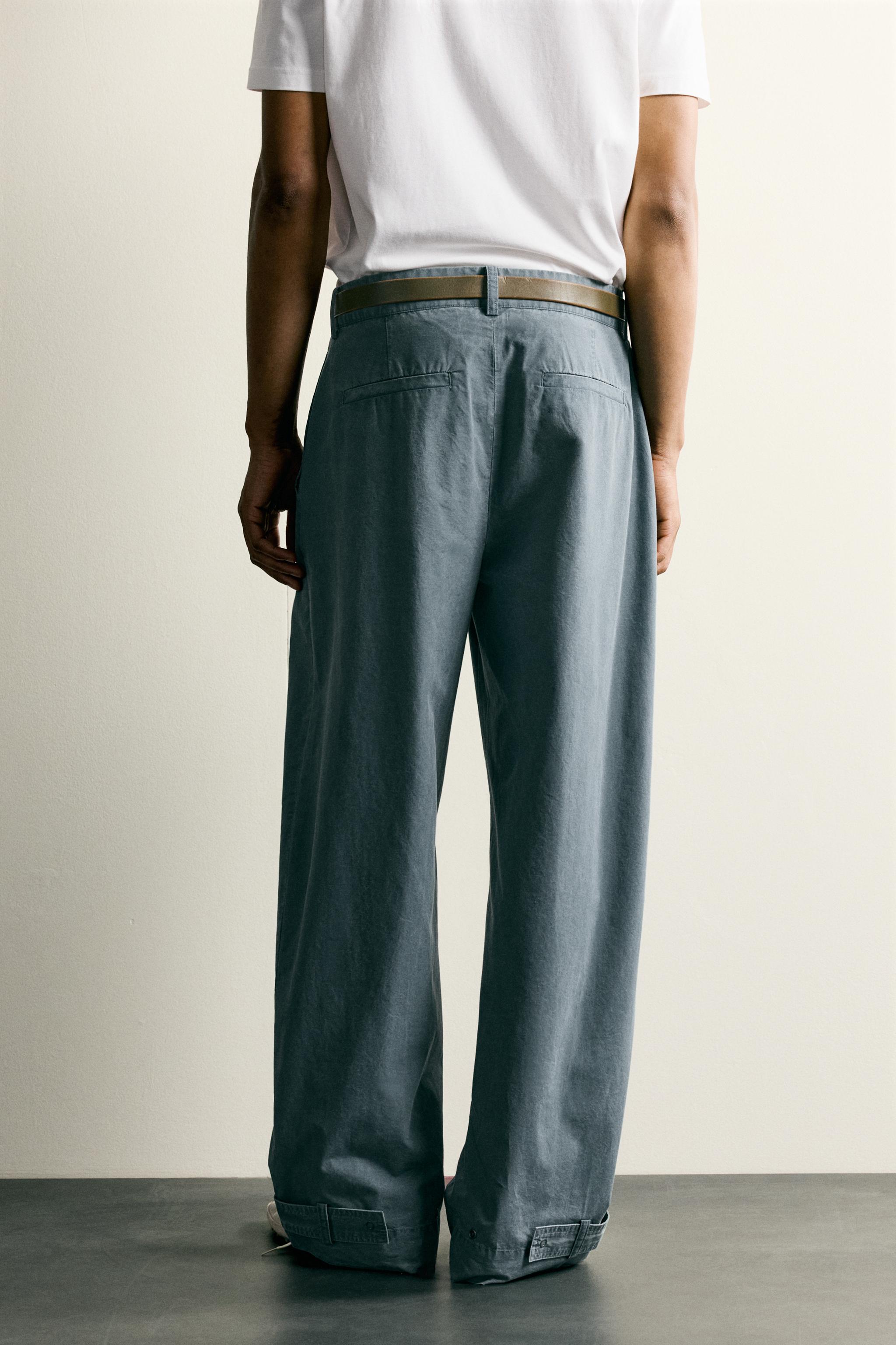 PANTALON DÉLAVÉ COUPE DÉCONTRACTÉE AVEC PATTES