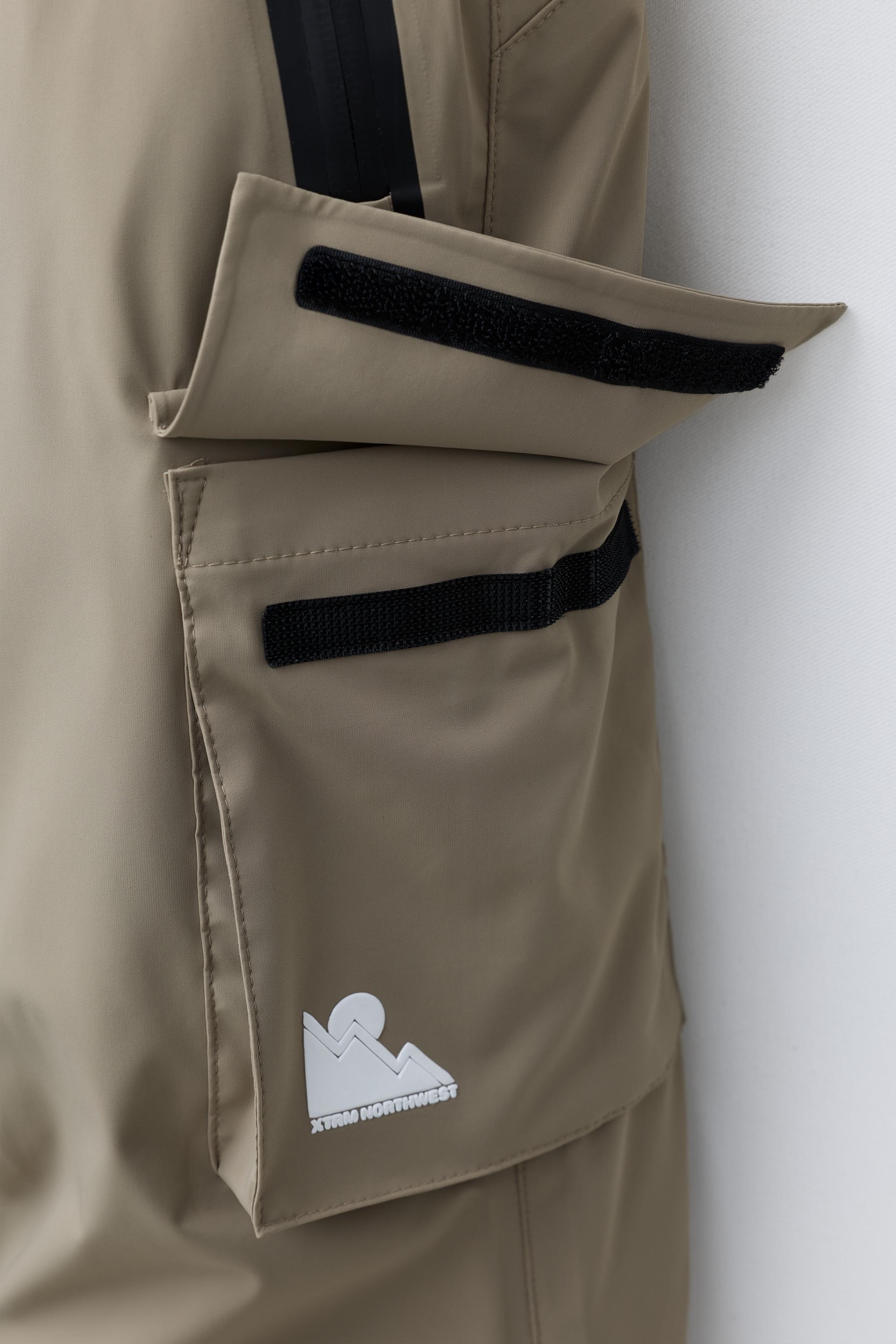 PANTALON À BRETELLES WATERPROOF ET COUPE-VENT SYSTÈME RECCO® COLLECTION SKI