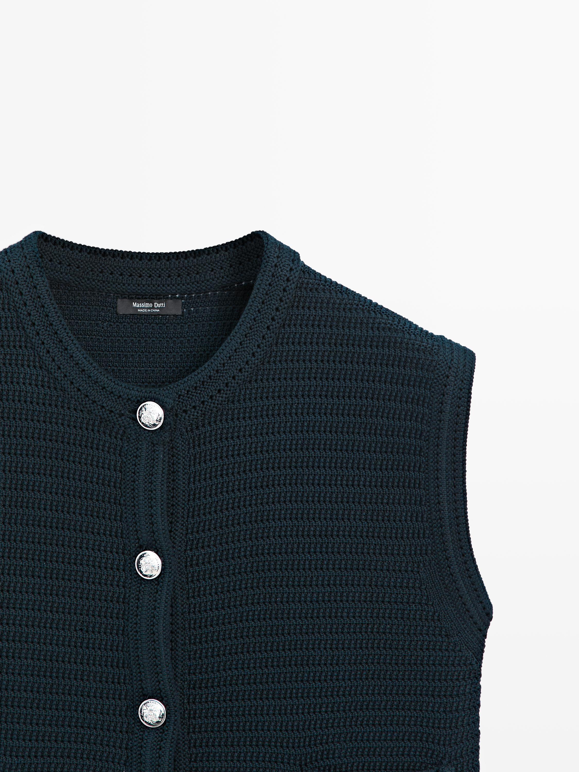 Knit vest with golden buttons