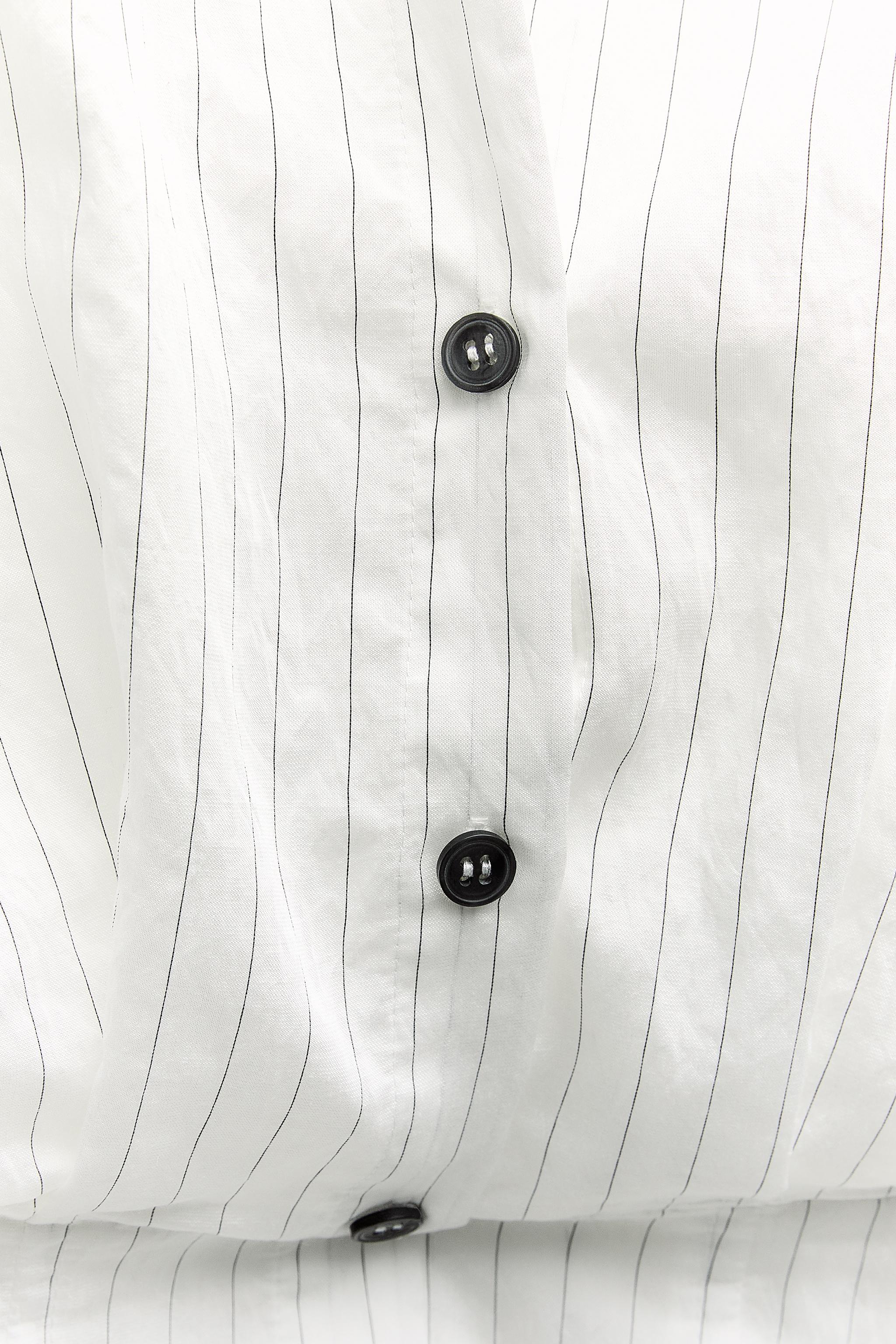 White shirt hot sale black line