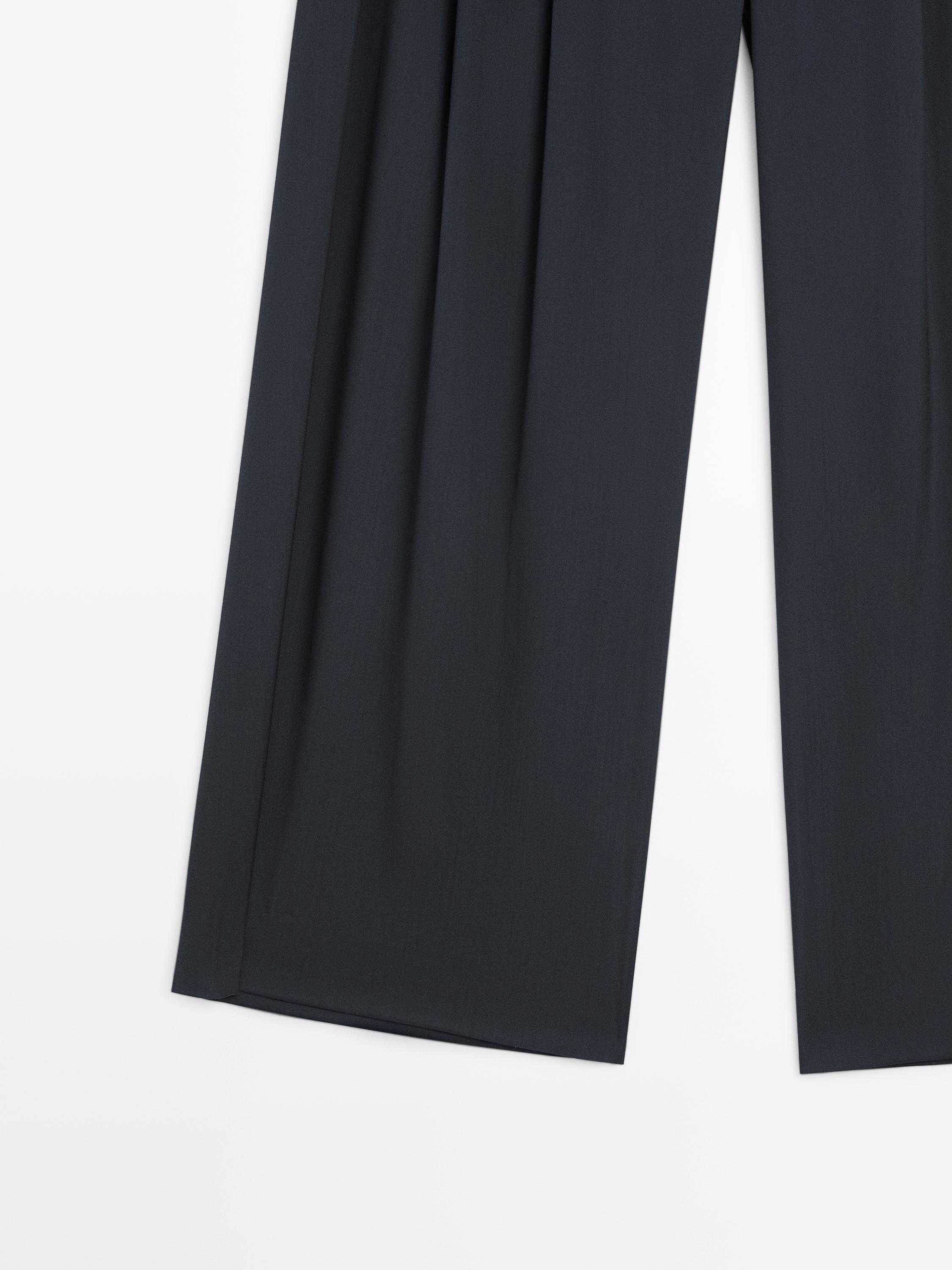 Pleated wool blend trousers