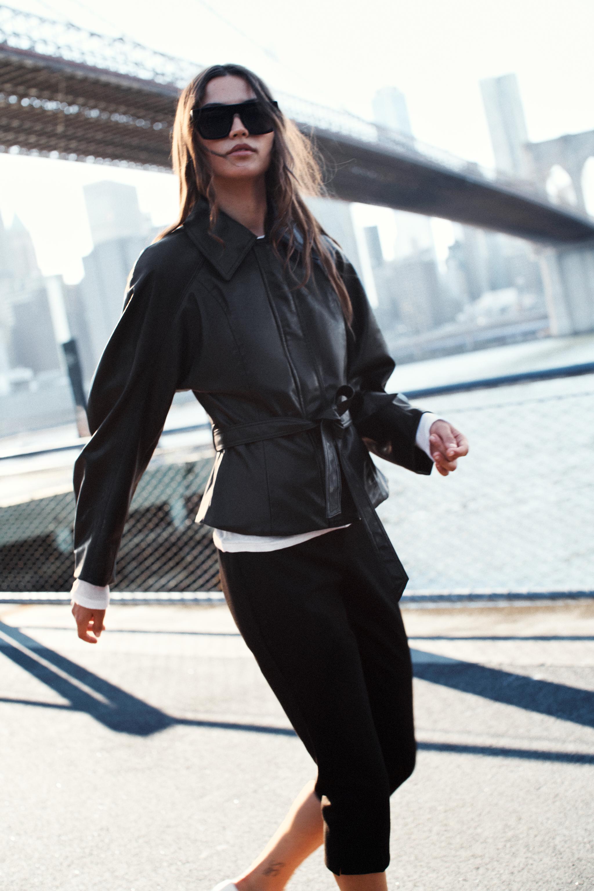 LEATHER-EFFECT BELTED JACKET