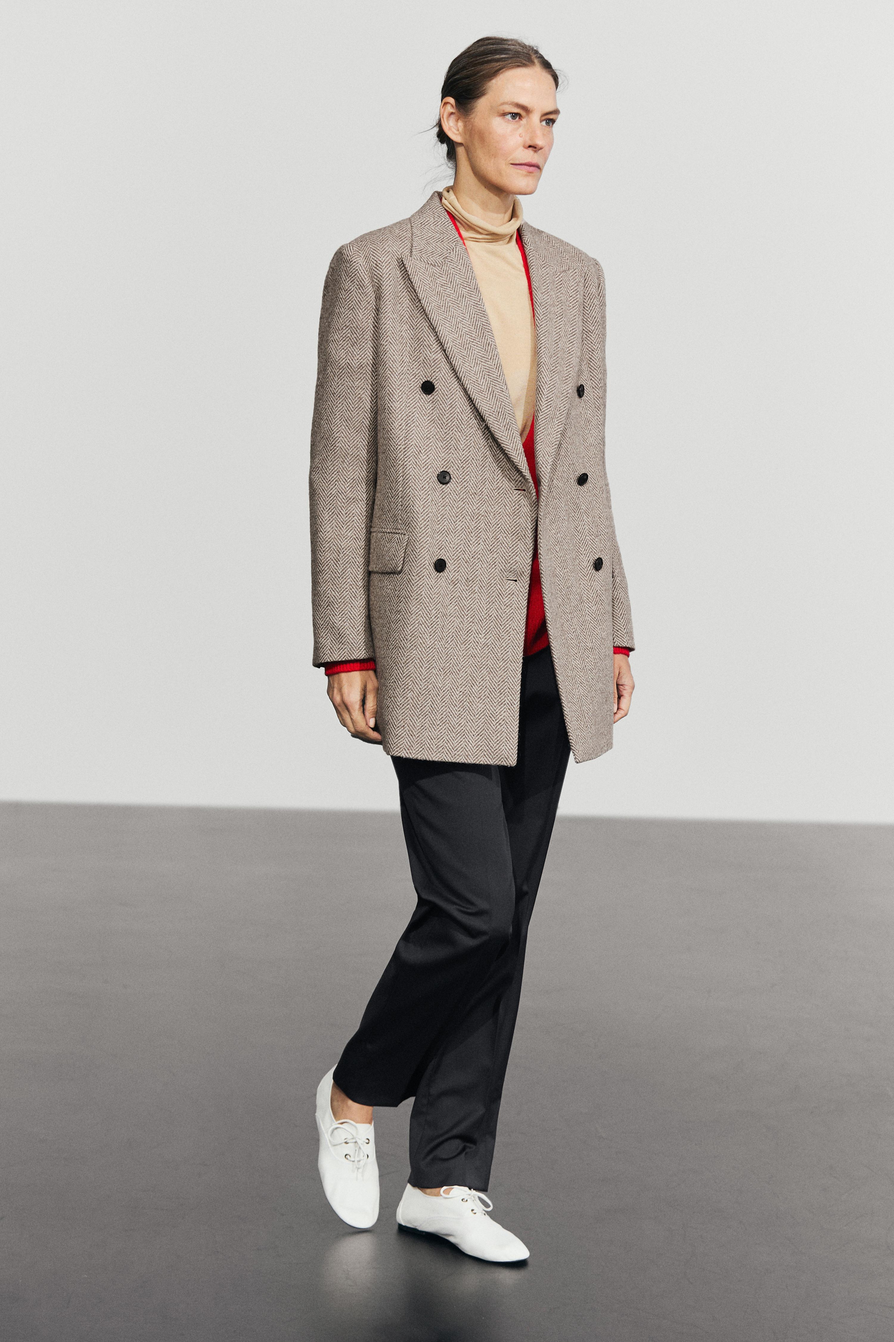 Mid-length double-breasted herringbone coat