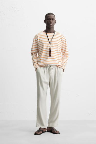 PANTALÓN FLUIDO RELAXED FIT - Hielo de Zara