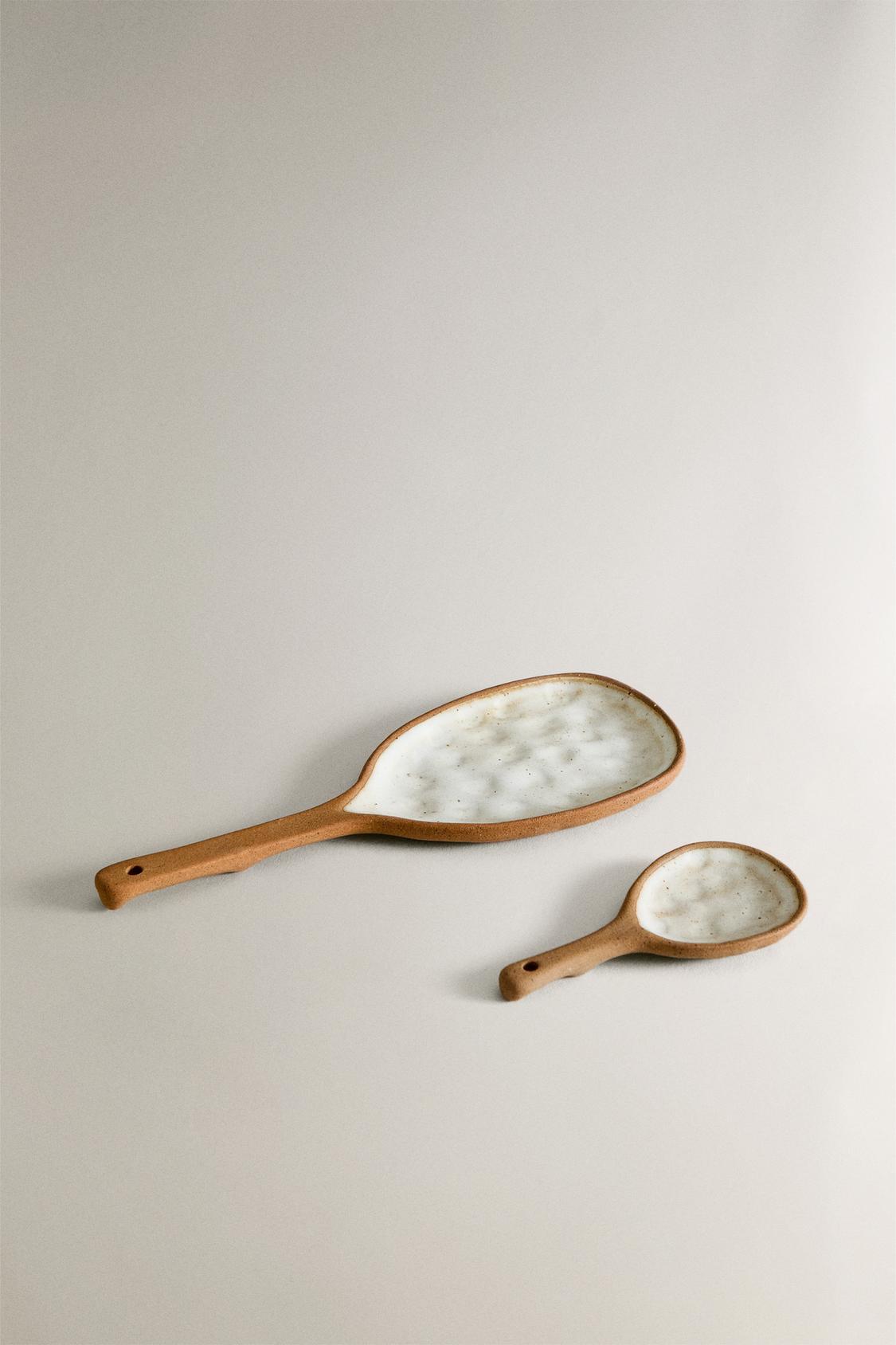 SPOON WITH RAISED DESIGN