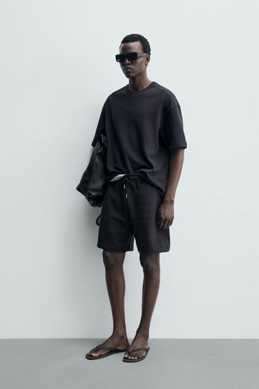 СУИТШЪРТ СЪС СВОБОДНА КРОЙКА INTERLOCK - Дълбинно син от Zara