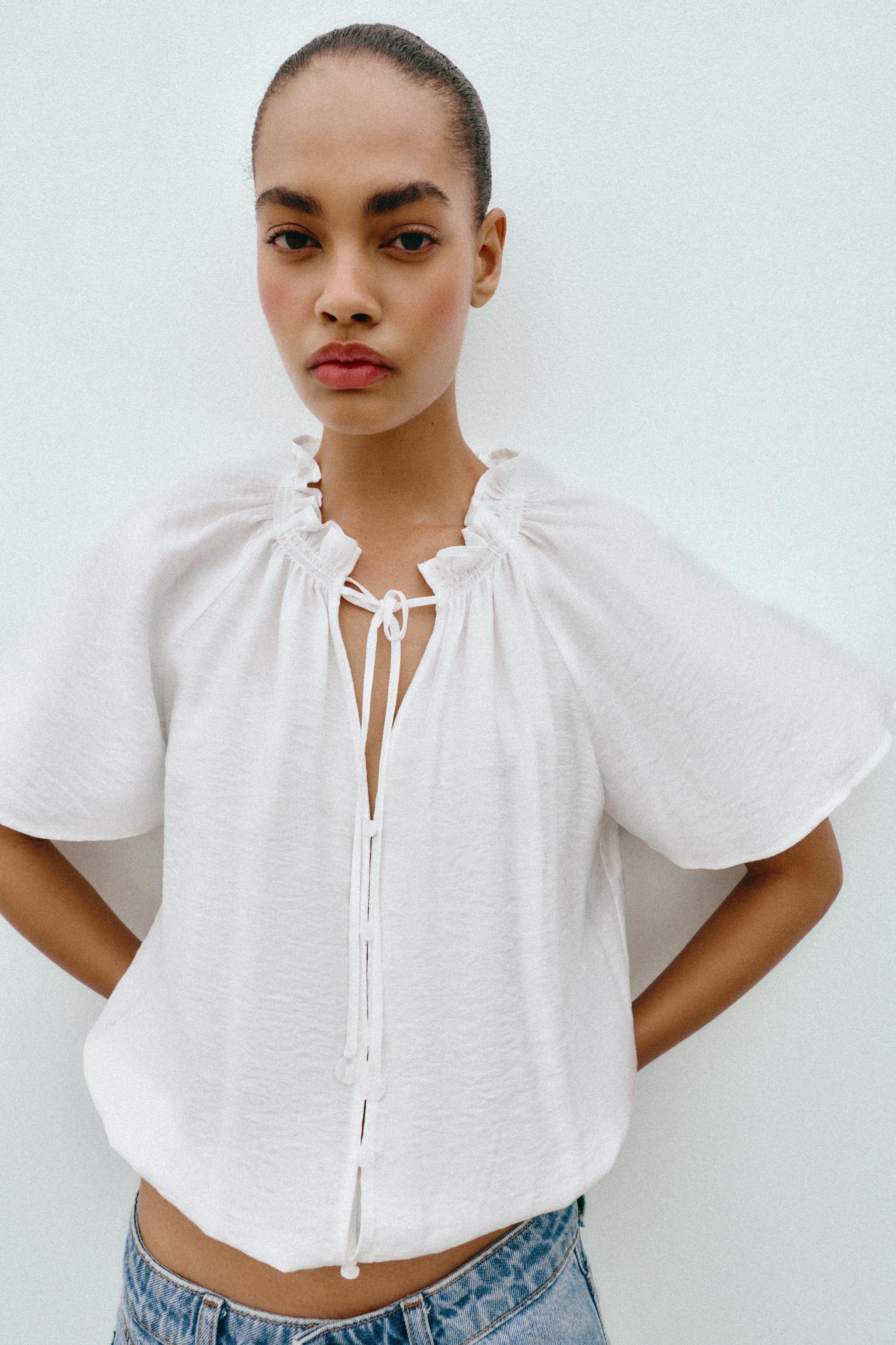 BLOUSE ROMANTIQUE À VOLANT