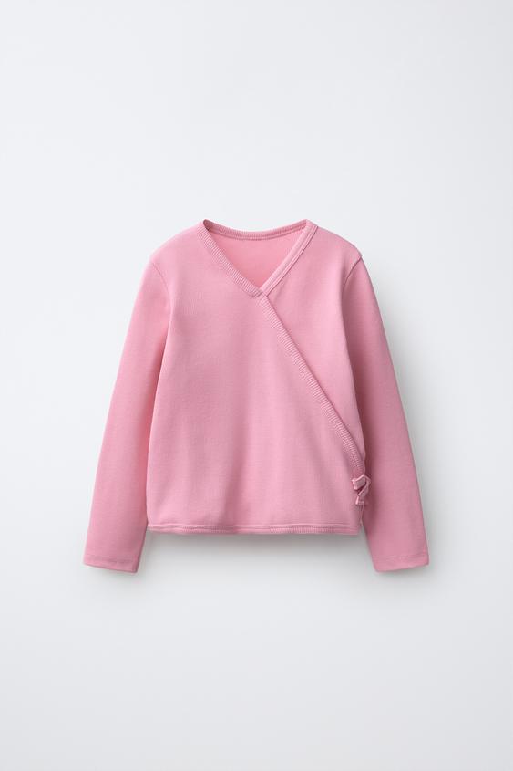RIBBED SURPLICE TOP WITH BOW - Pale pink de Zara - Imagen 0