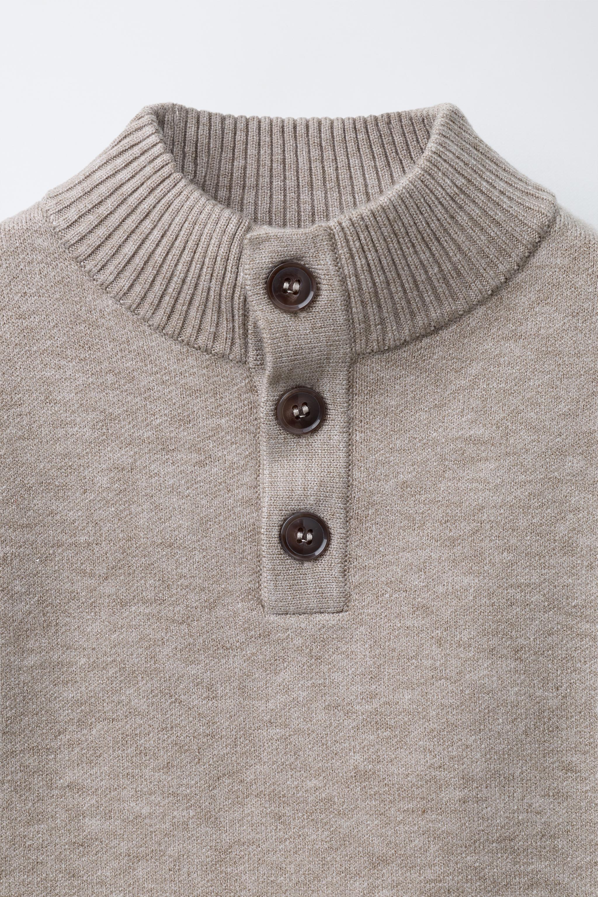 BUTTON KNIT SWEATER
