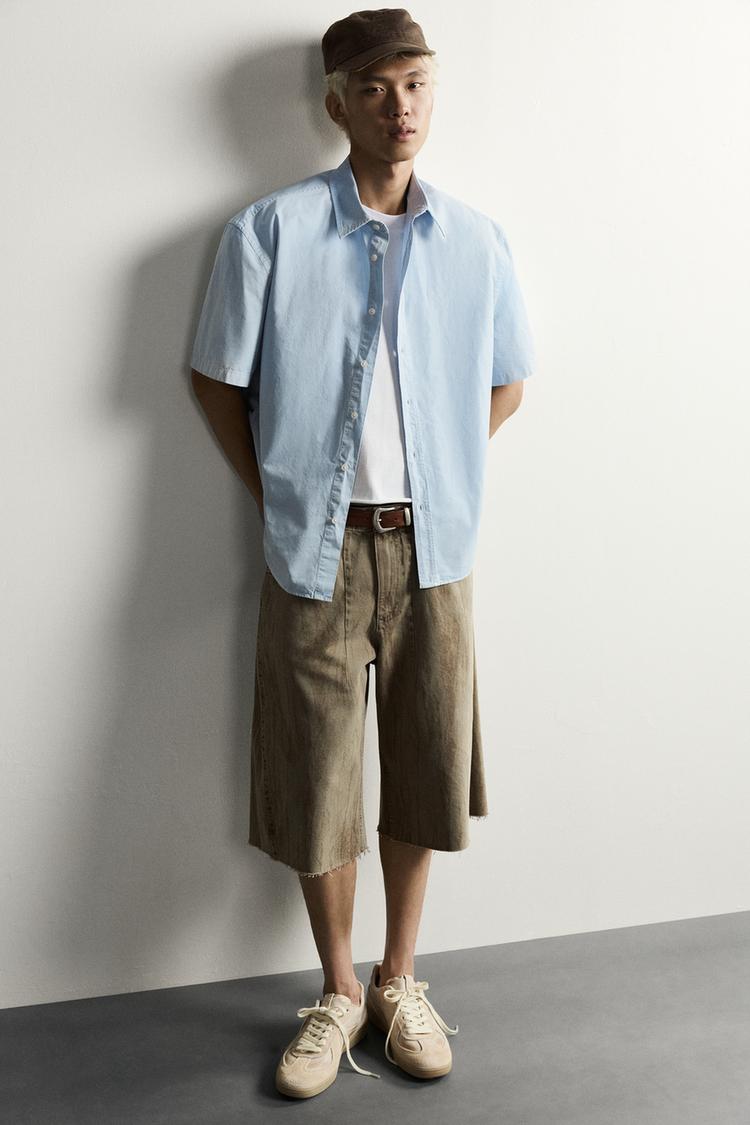 Pantalones cortos de mezclilla con estampado desgastado 5