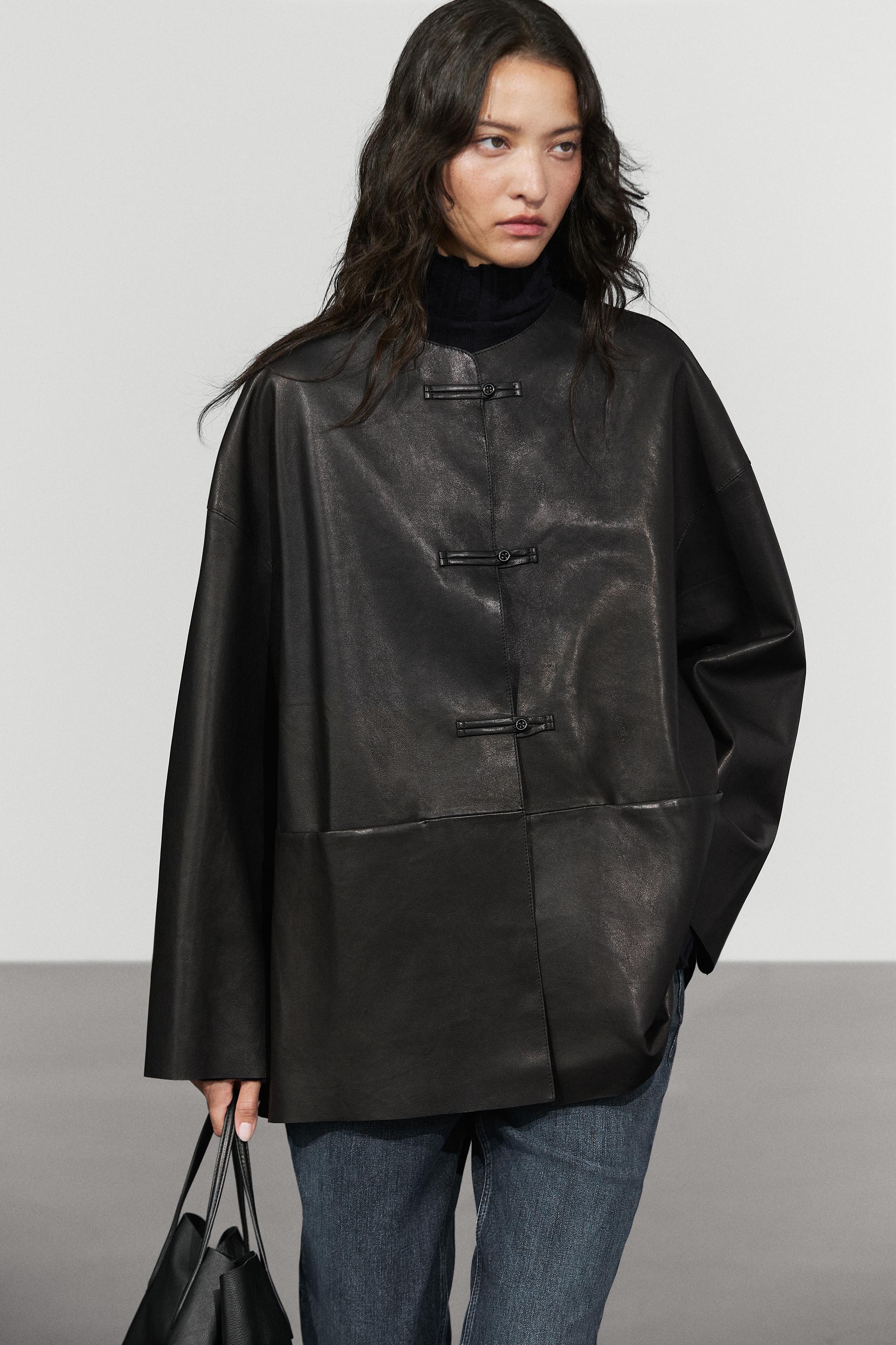 Leather jacket with toggle detail