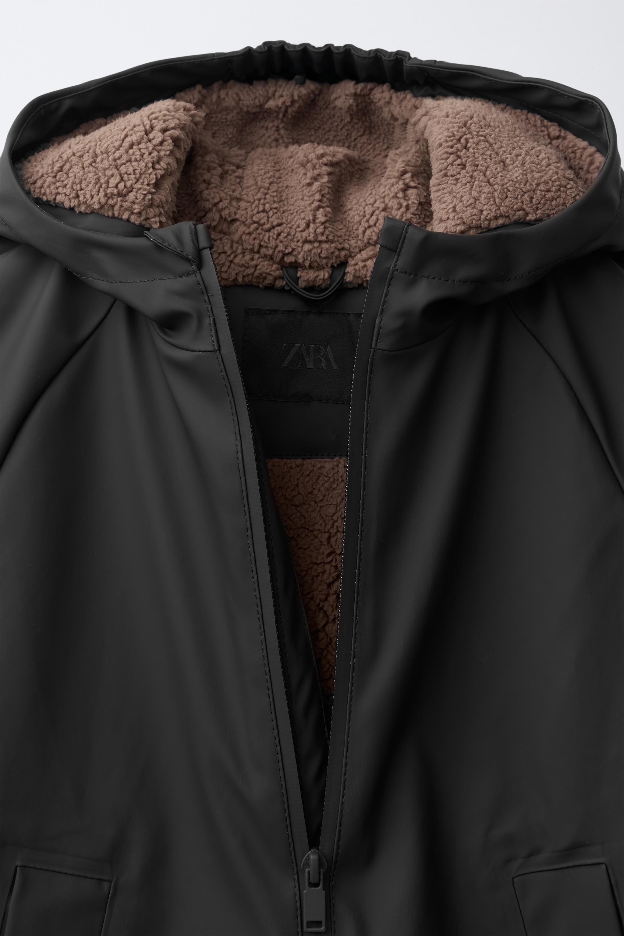WATER-RESISTANT FAUX SHEARLING LINED RAINCOAT