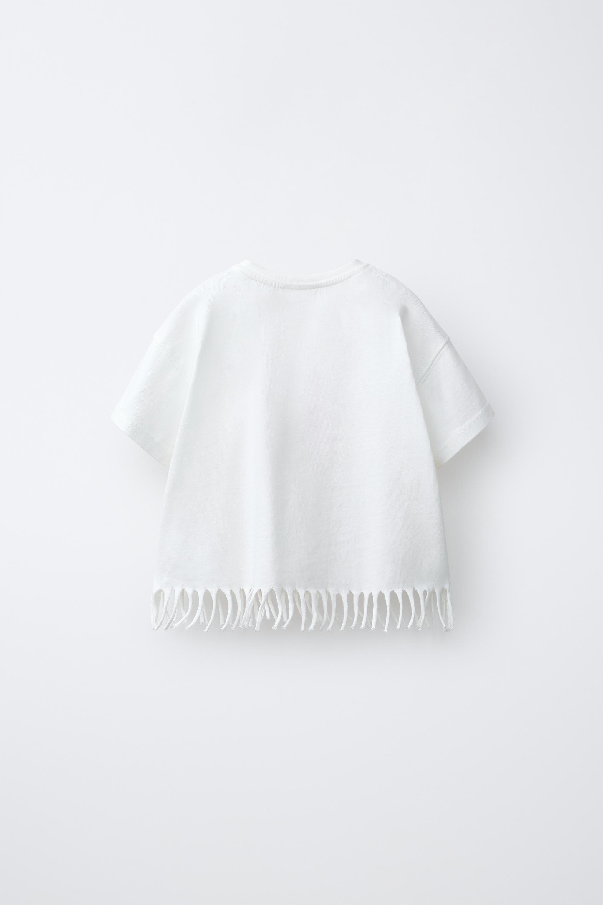 T-SHIRT FLEURI À FRANGES ET PAILLETTES