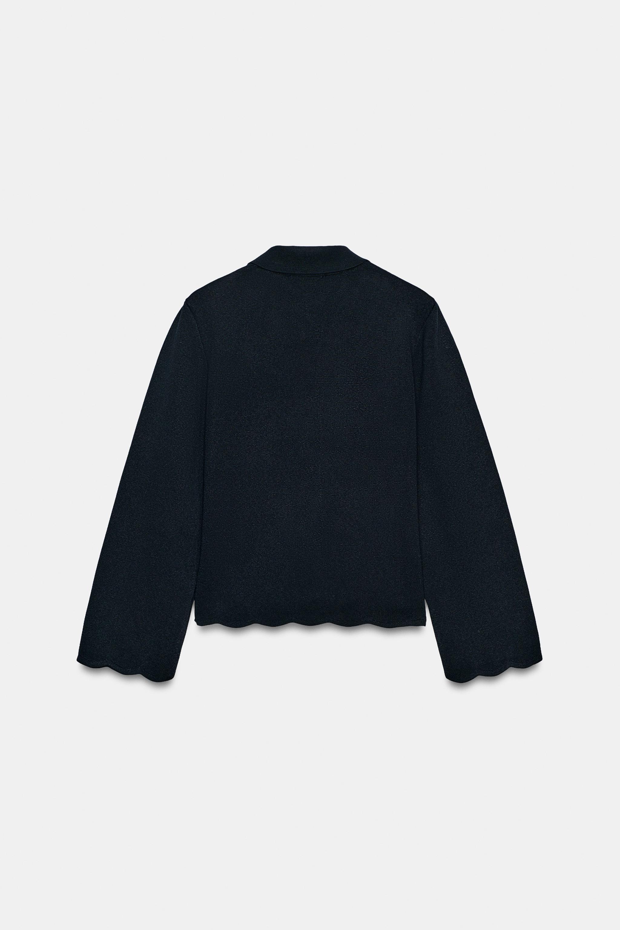 GILET EN MAILLE À BAS ONDULÉ