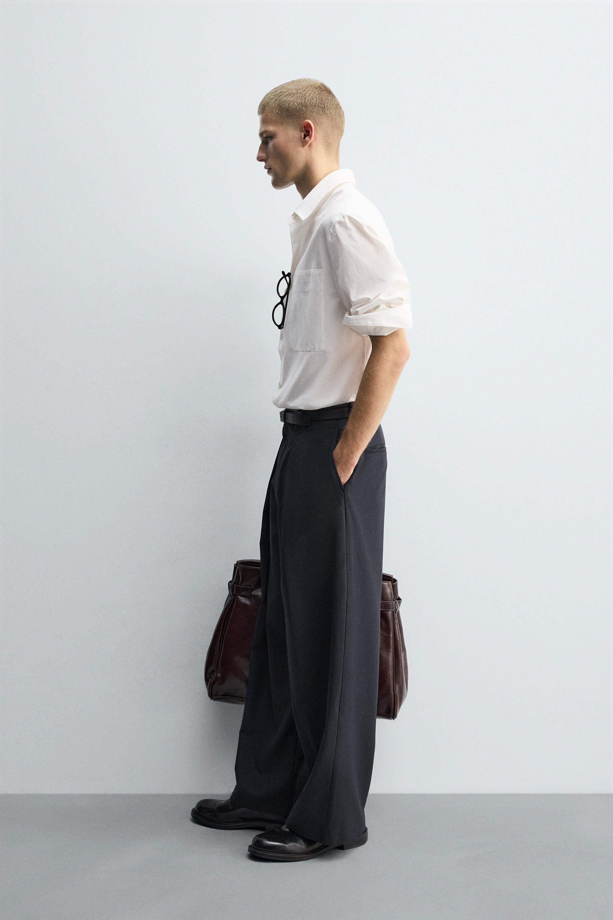 PLEATED PINSTRIPE PANTS