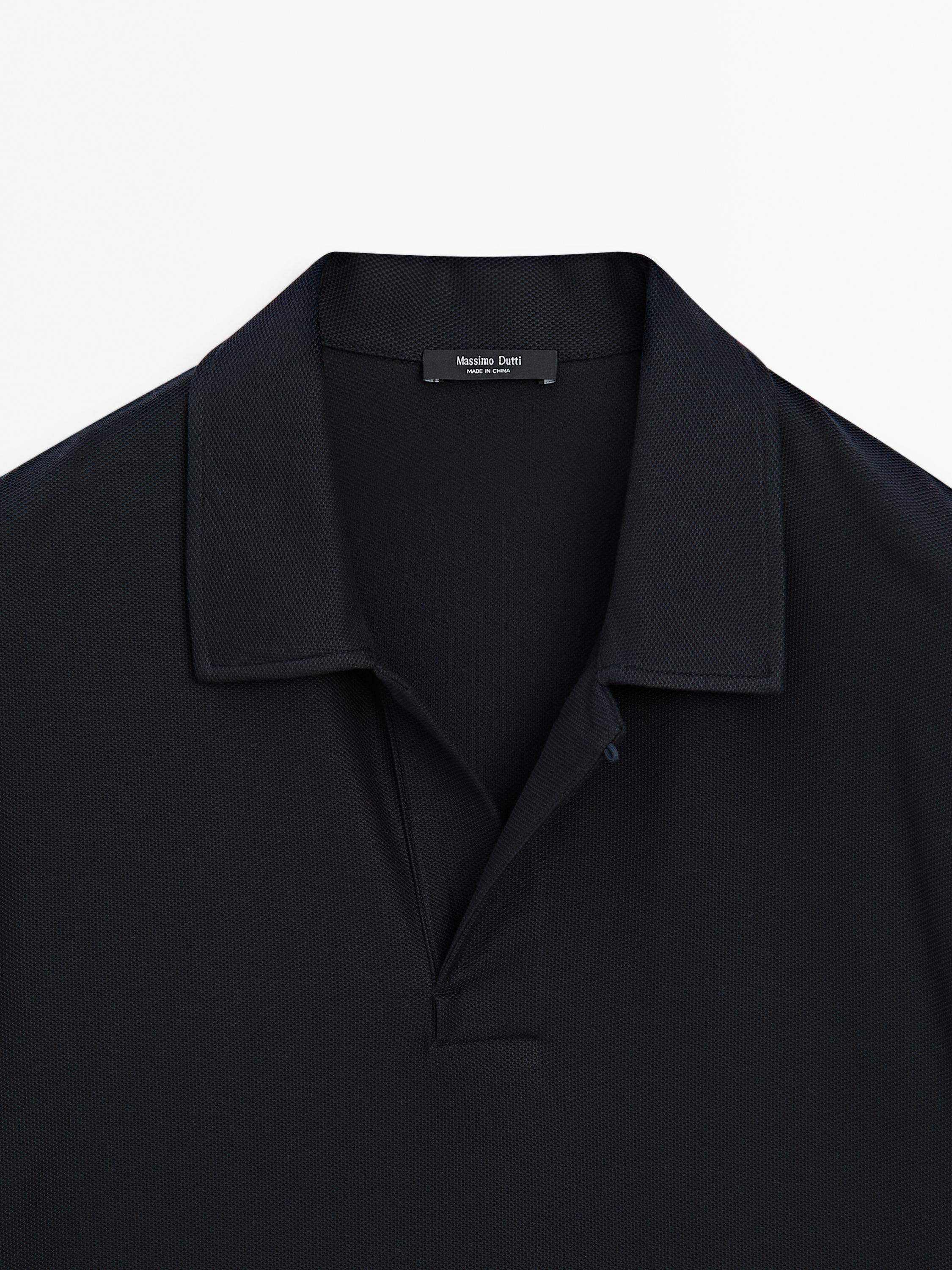Textured polo shirt with hidden button