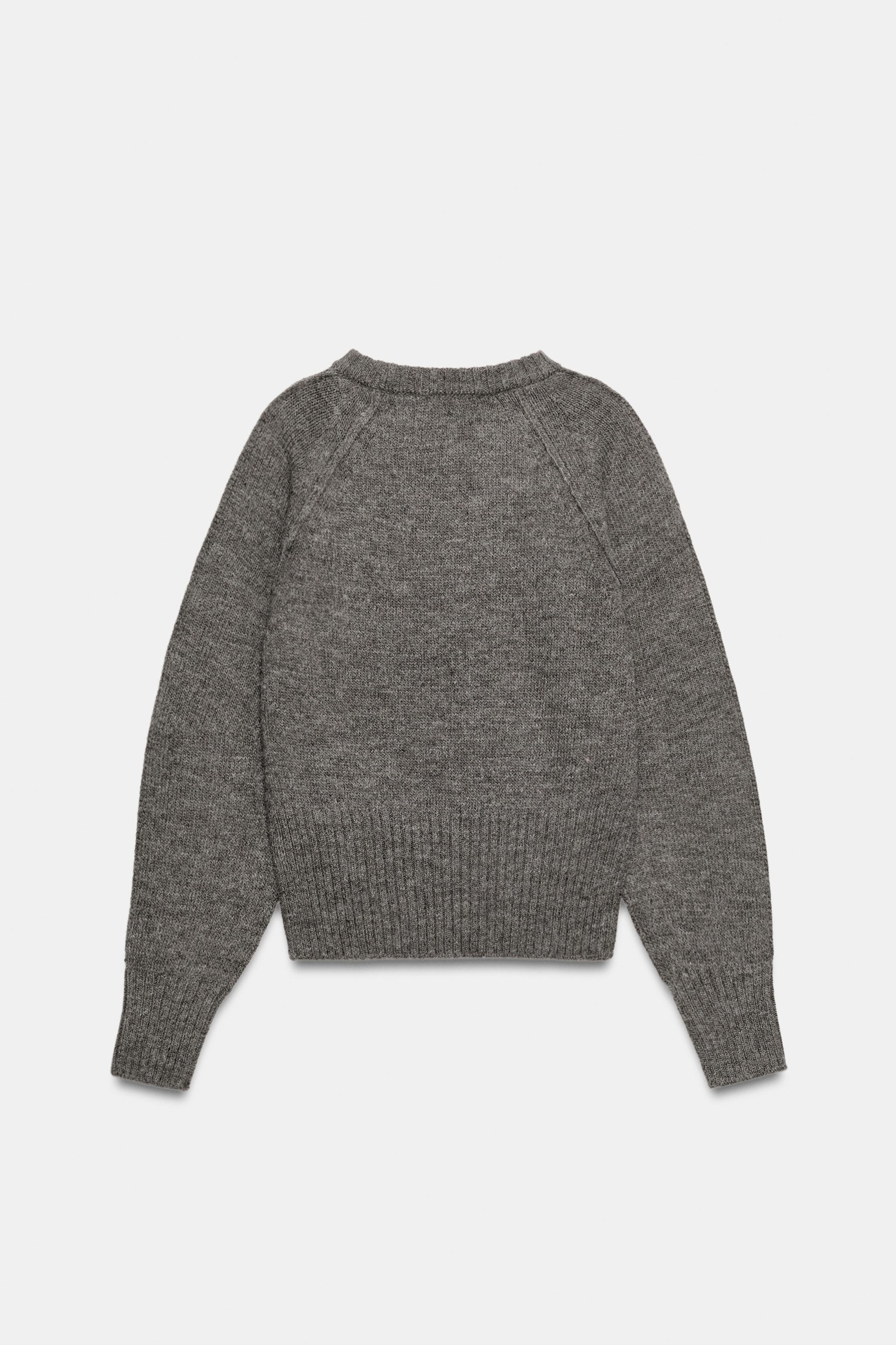 PULL EN MAILLE À COUTURES MARQUÉES AUX ÉPAULES