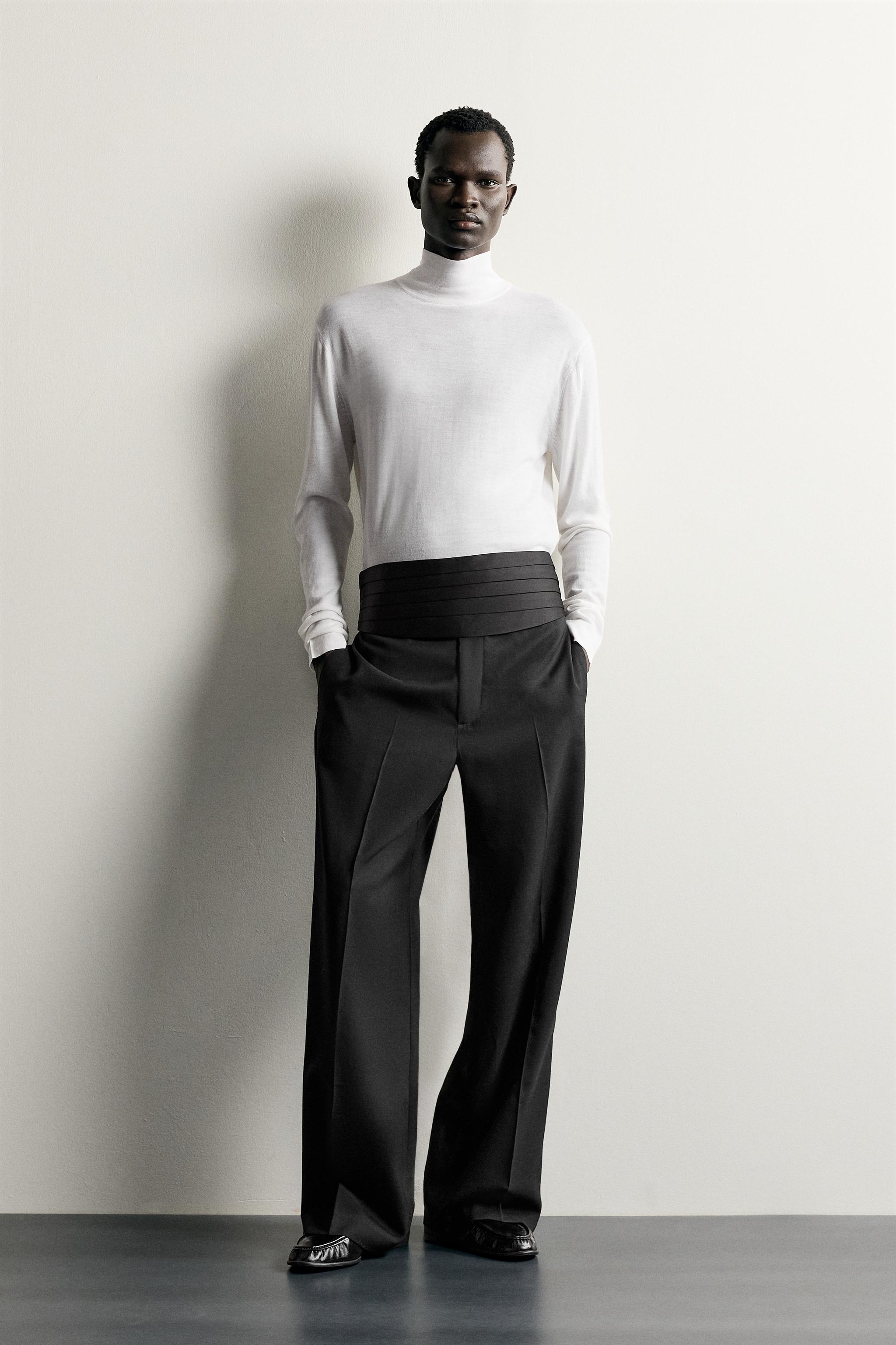100% WOOL HIGH NECK SWEATER
