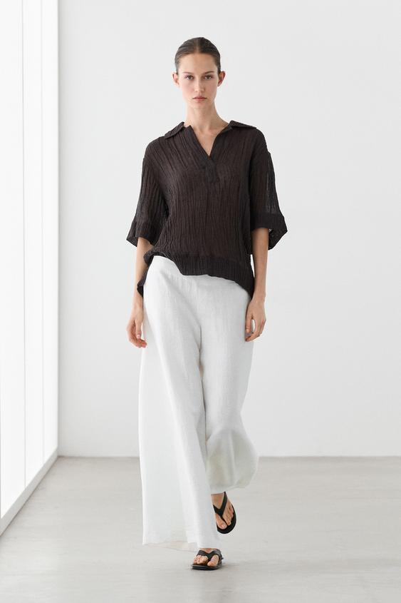 Flowing linen blend polo blouse from Zara - $130