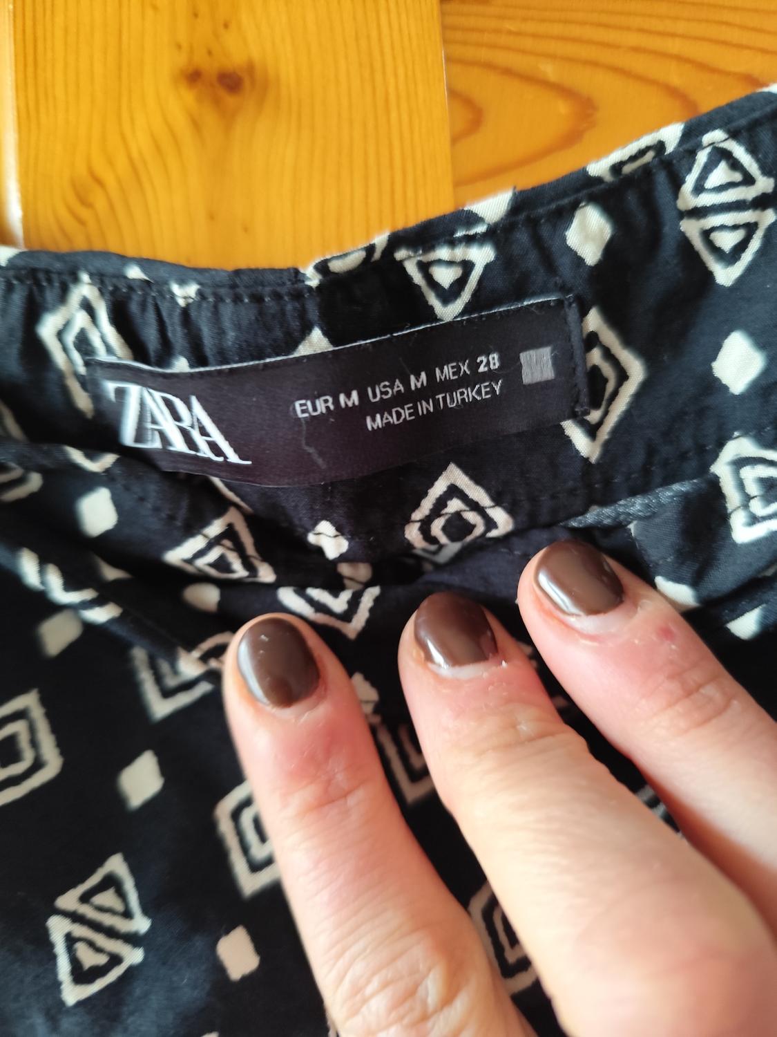 PRINTED SKORT WITH TASSELS - Image 4