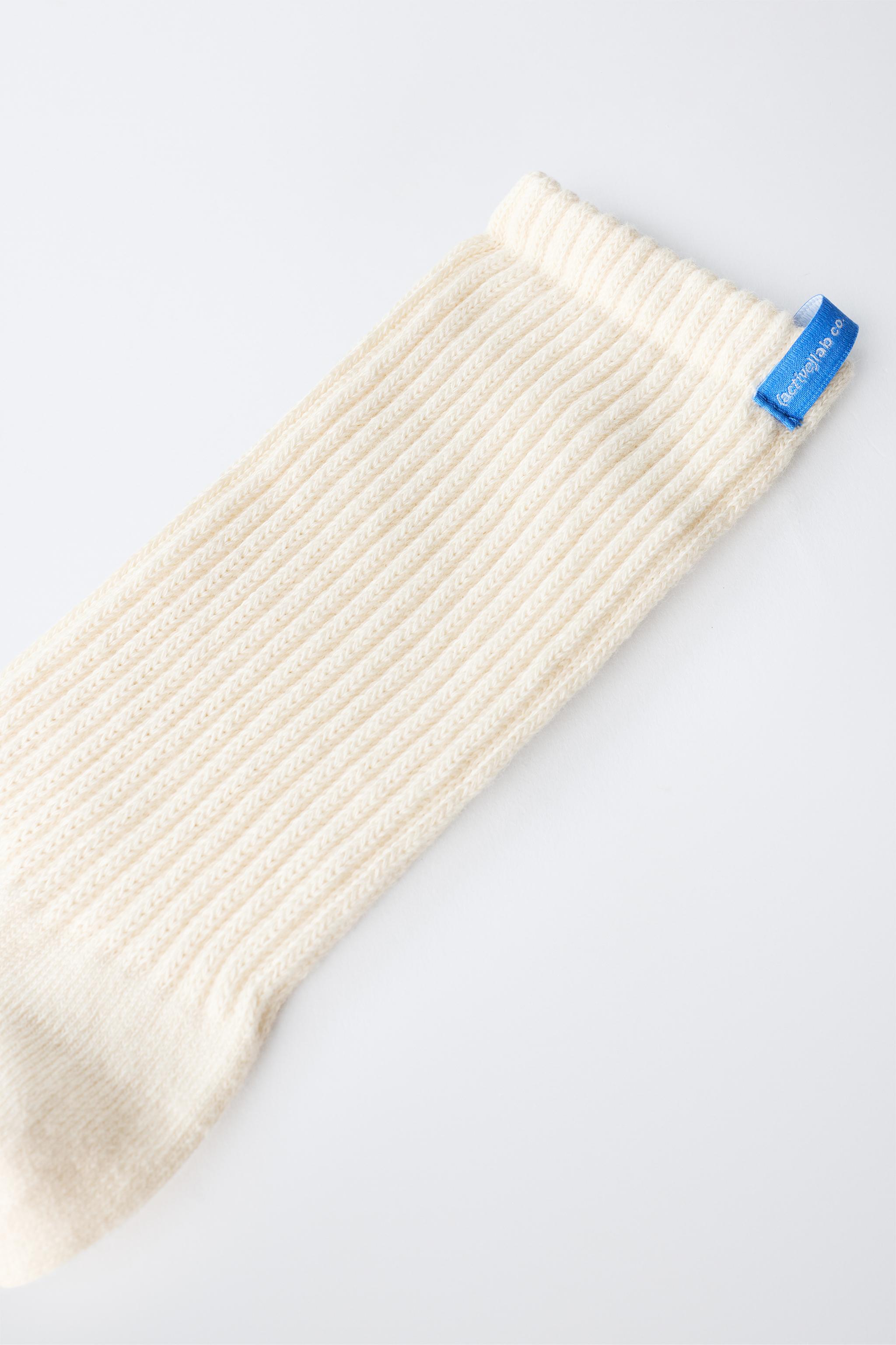 RIBBED MID-CALF SOCKS WITH LABEL — Ecru