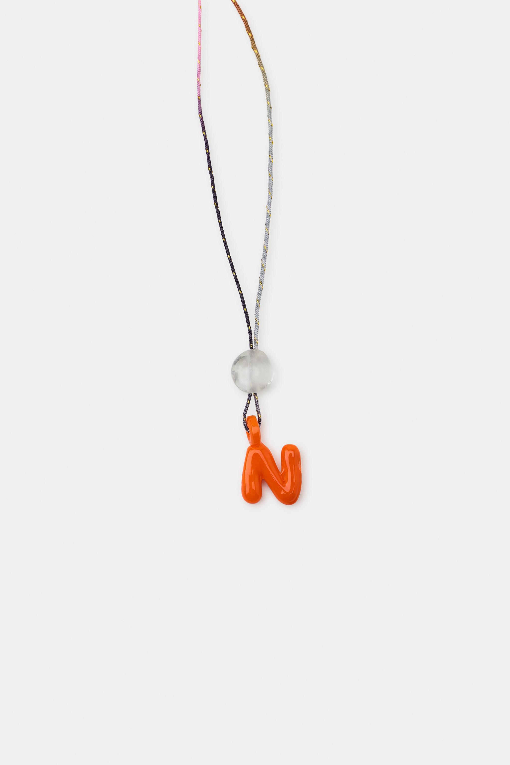 ALPHABET LETTER CORD NECKLACE — Orange