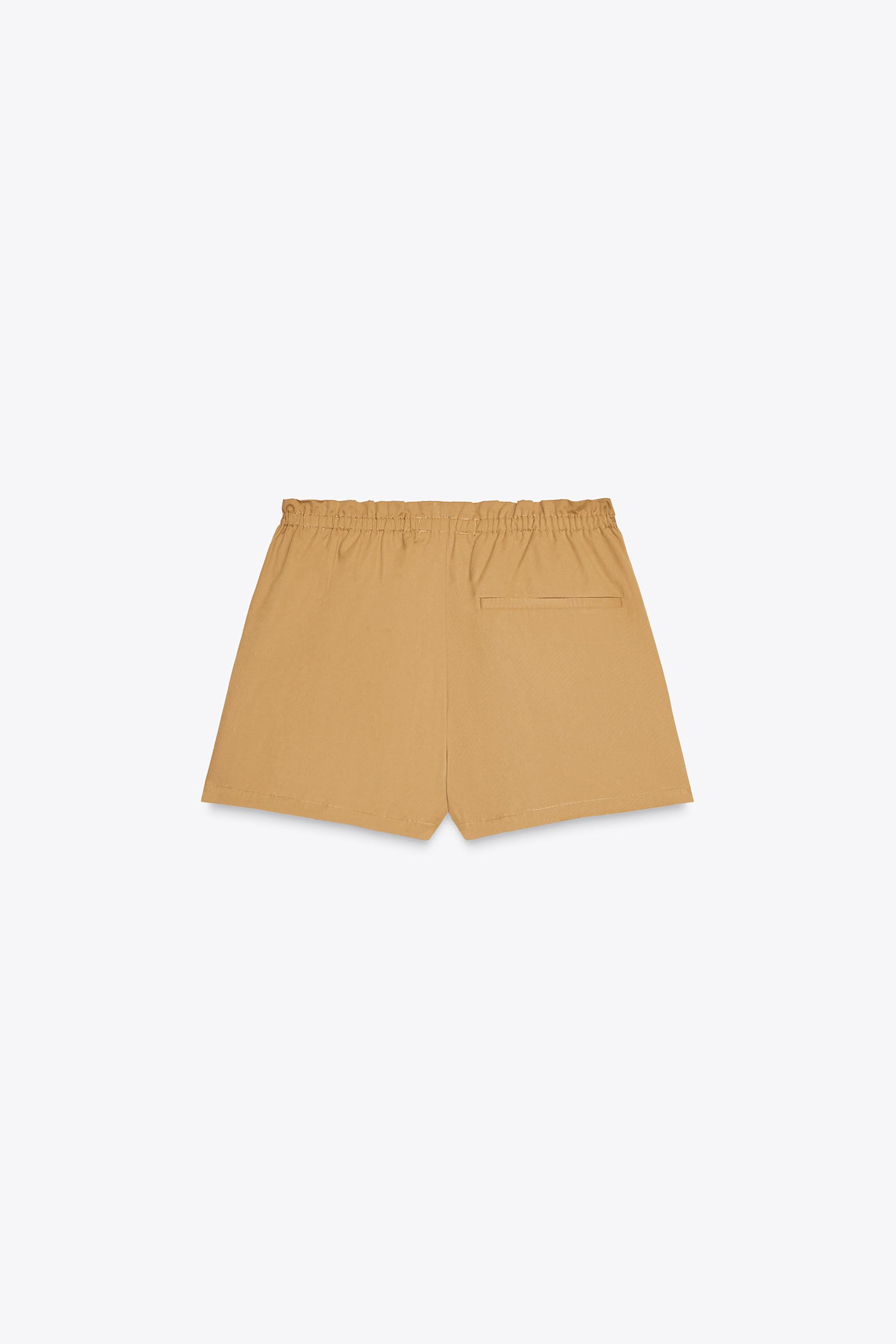 BUTTON SKORT