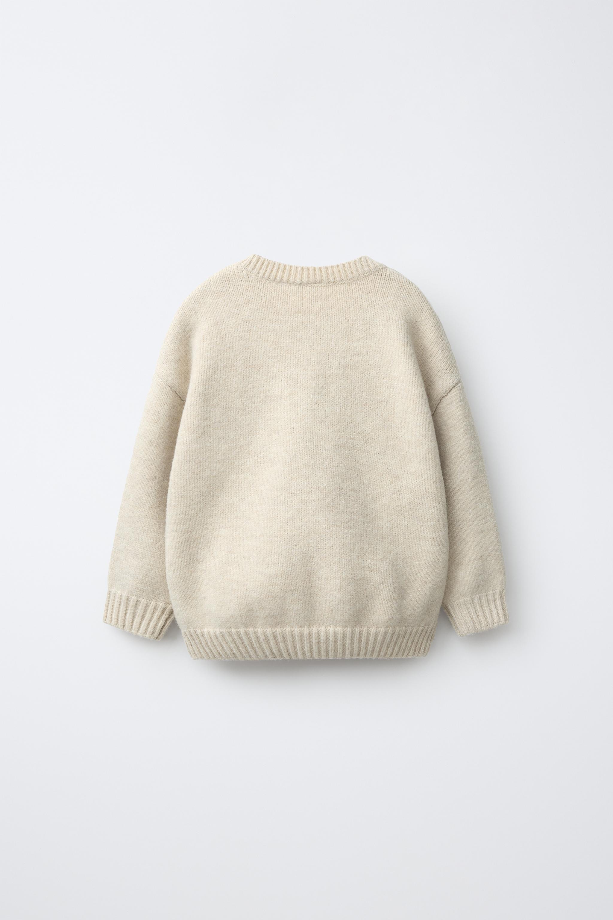 PULL EN MAILLE AVEC BRODERIES FERME