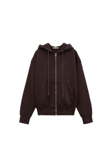 Front view of a dark brown hoodie with zip and front pockets.
