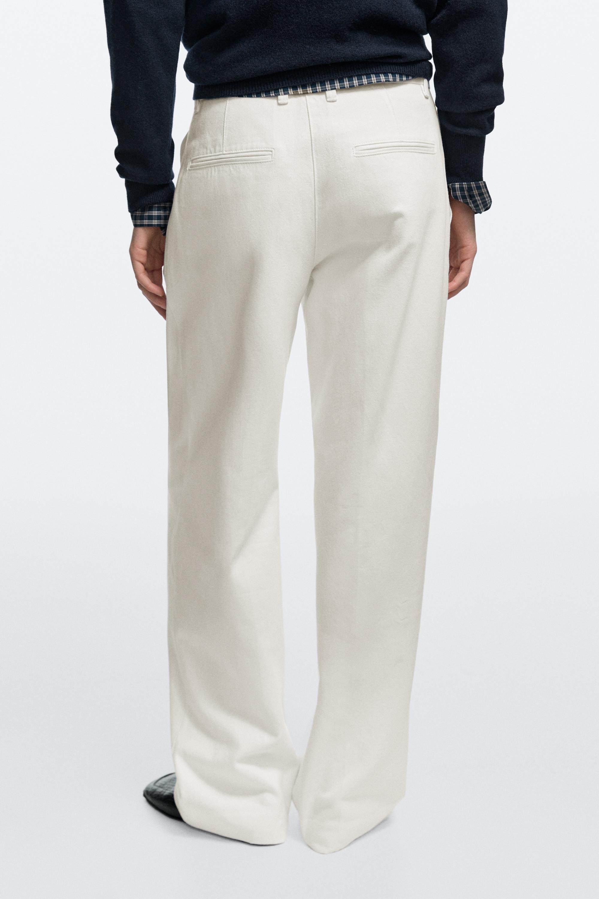 Pantalon wide leg taille basse à pinces