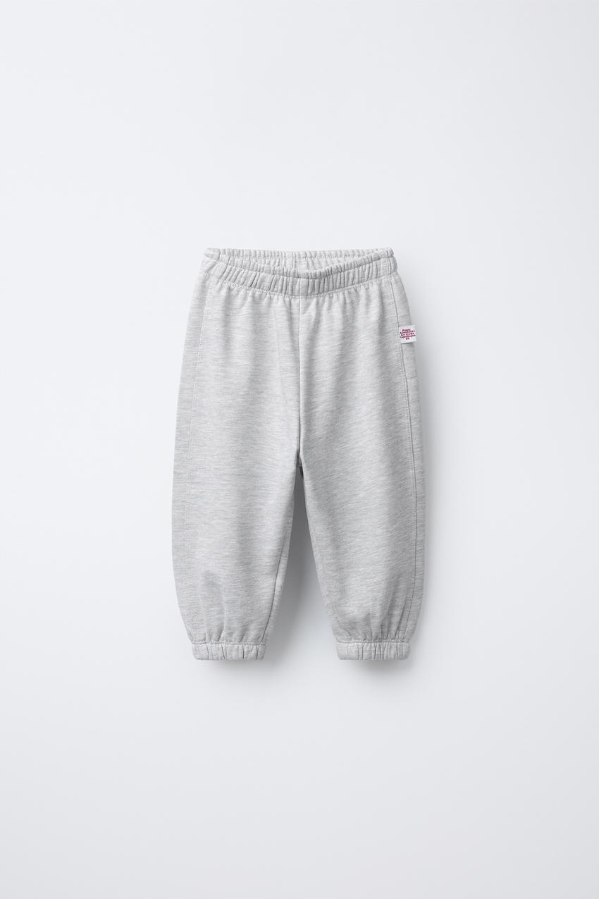 TWO-PACK OF PLUSH JOGGER TROUSERS WITH LABEL