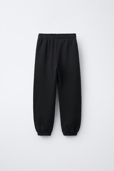 CONJUNTO SUDADERA Y PANTALÓN FELPA TEXTO - Negro de Zara