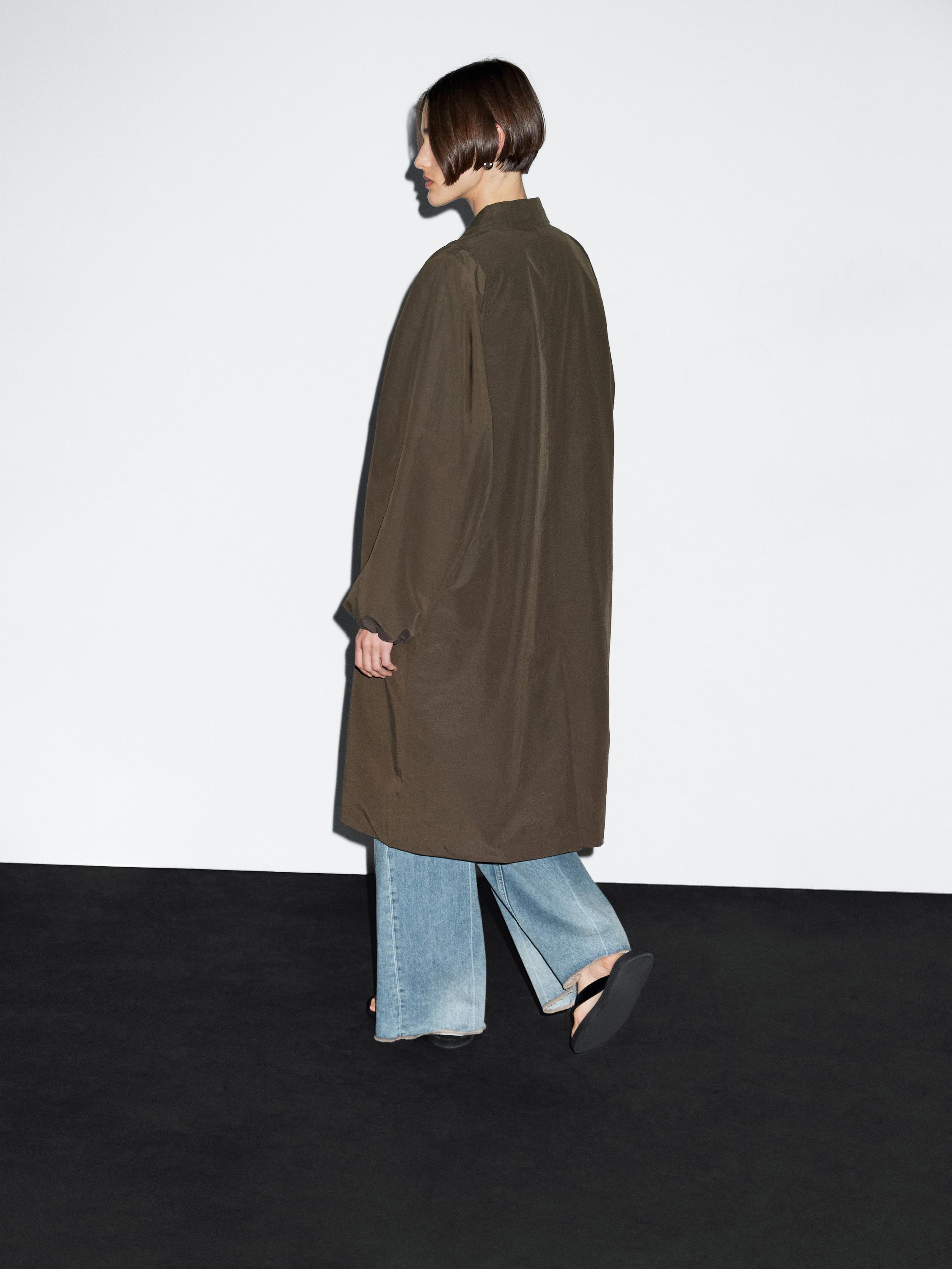 Technical fabric trench coat with button detail