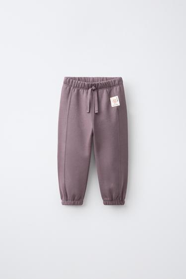 PANTALÓN JOGGER ETIQUETA ANIMALITOS - Morado de Zara - Imagen 0