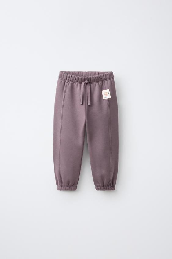PANTALÓN JOGGER ETIQUETA ANIMALITOS - Morado de Zara - Imagen 0