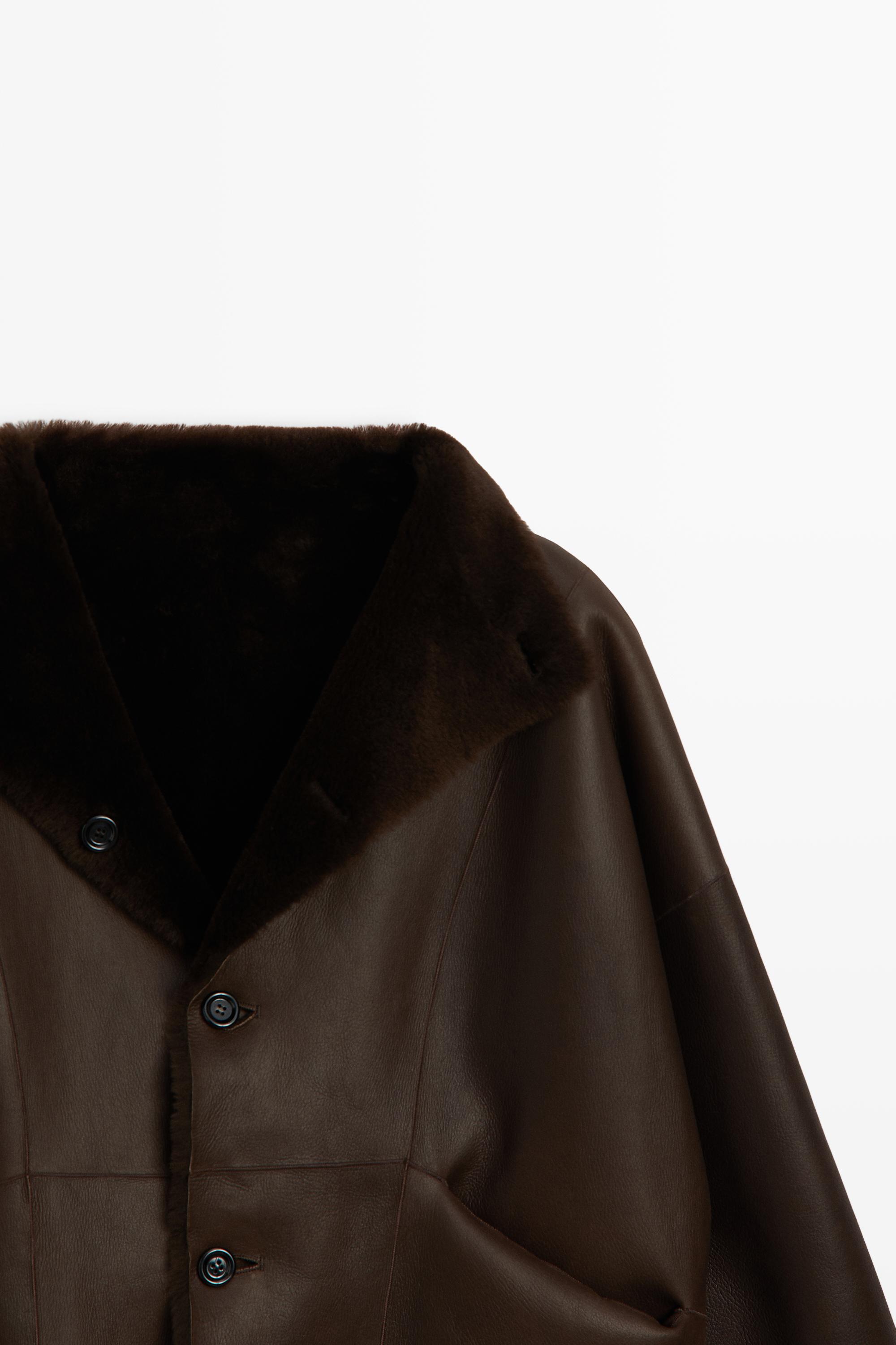 Manteau réversible en cuir avec fourrure