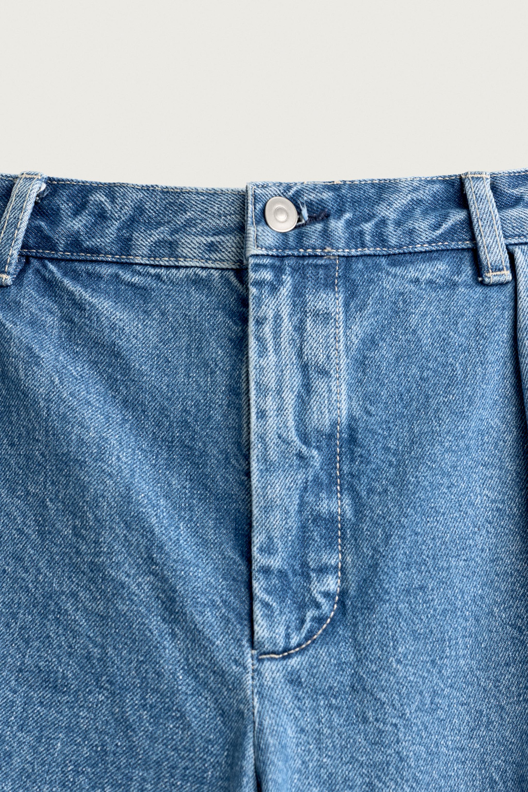 RELAXED FIT PLEATED DENIM CHINO SHORTS