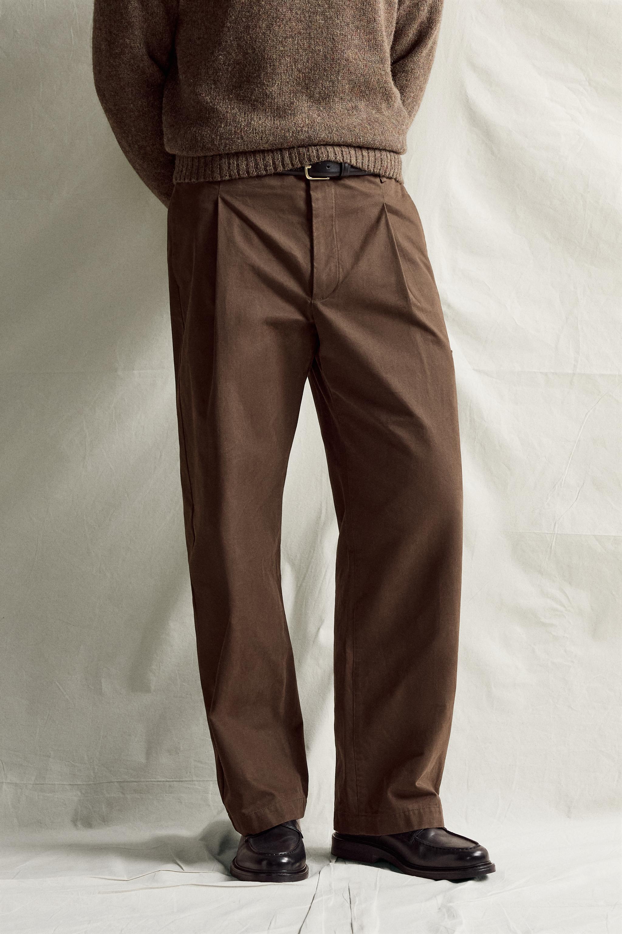 RELAXED FIT PLEATED PANTS