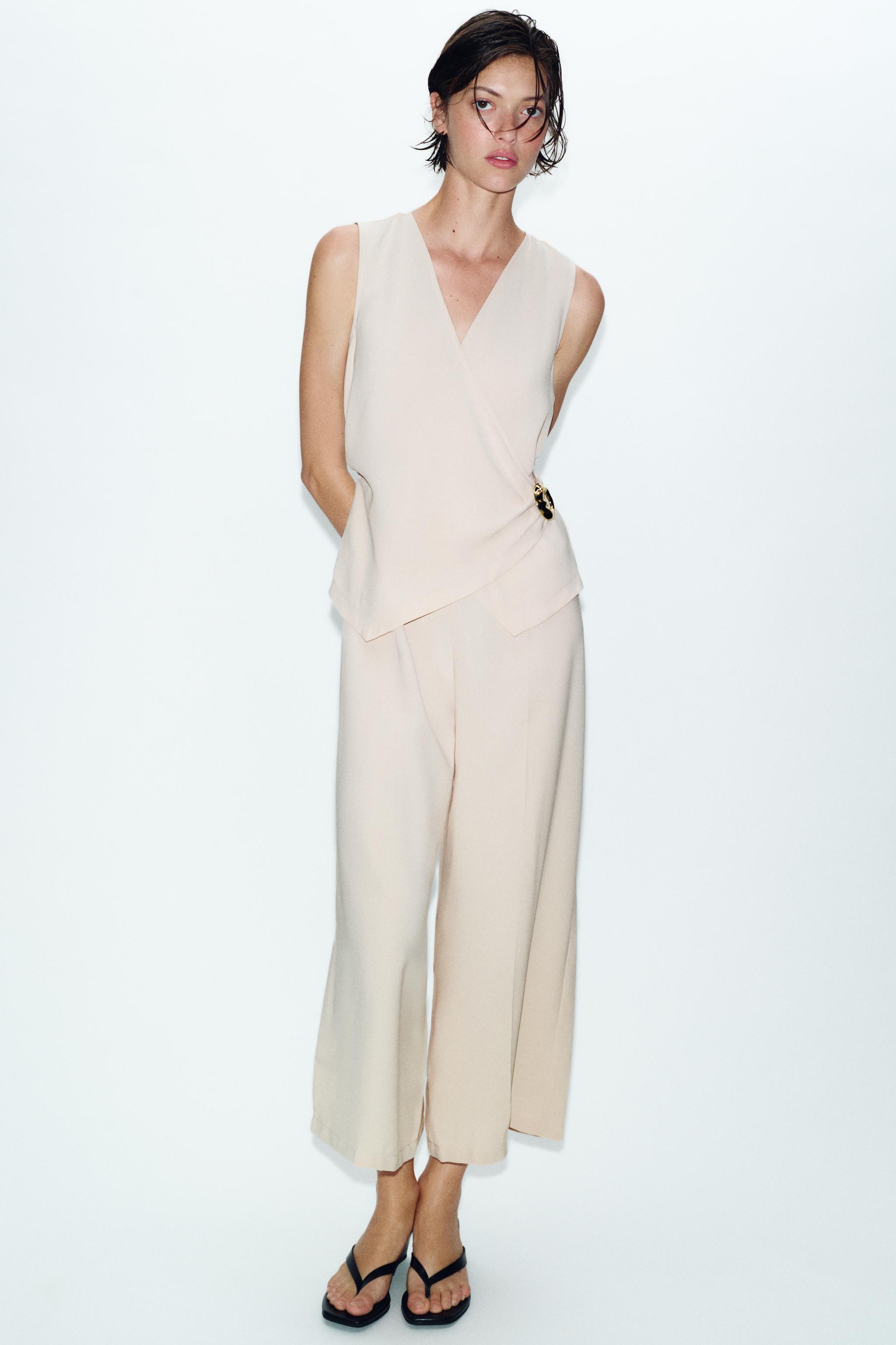 Jumpsuit con boton dorado