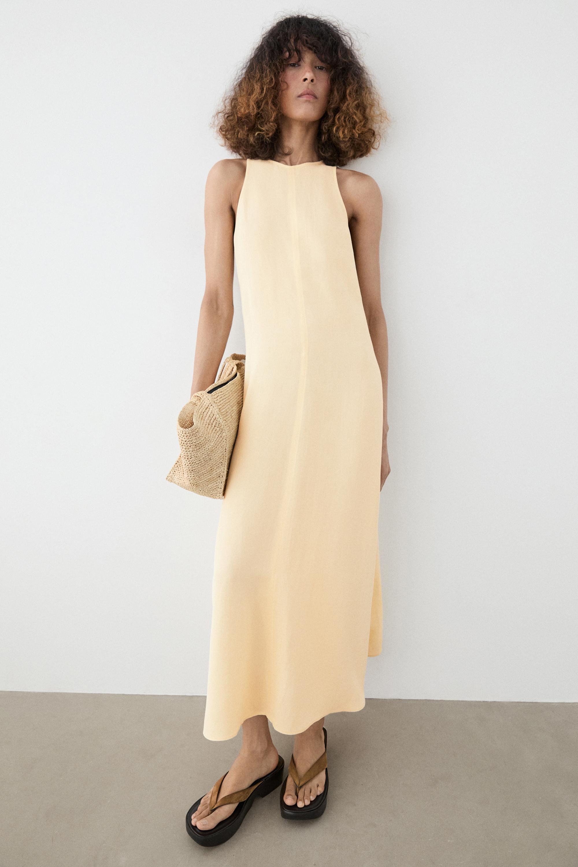 Flowing linen halter midi dress — Biscuit