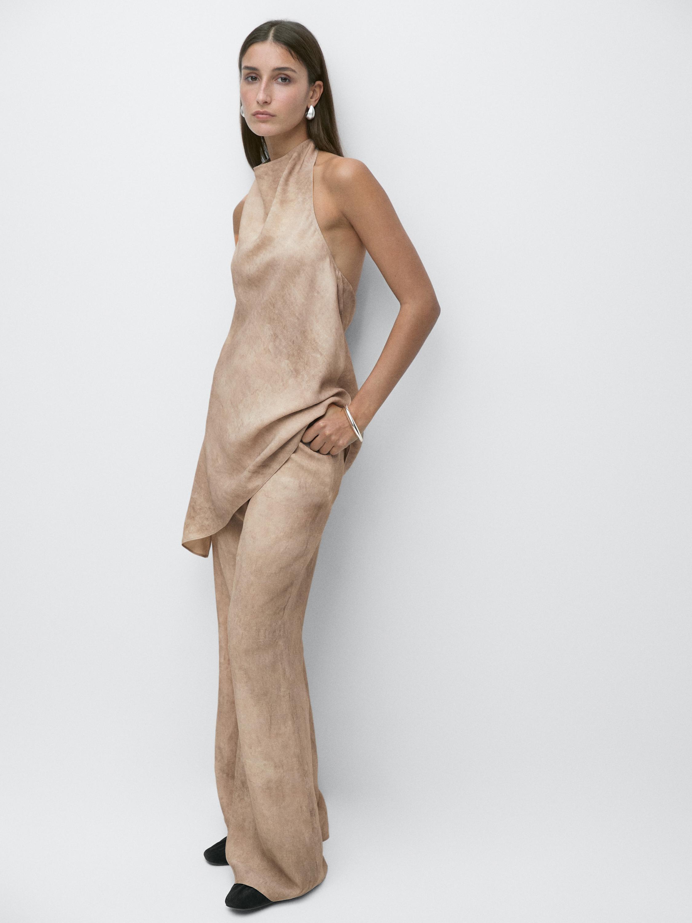 Distressed-effect flowing trousers