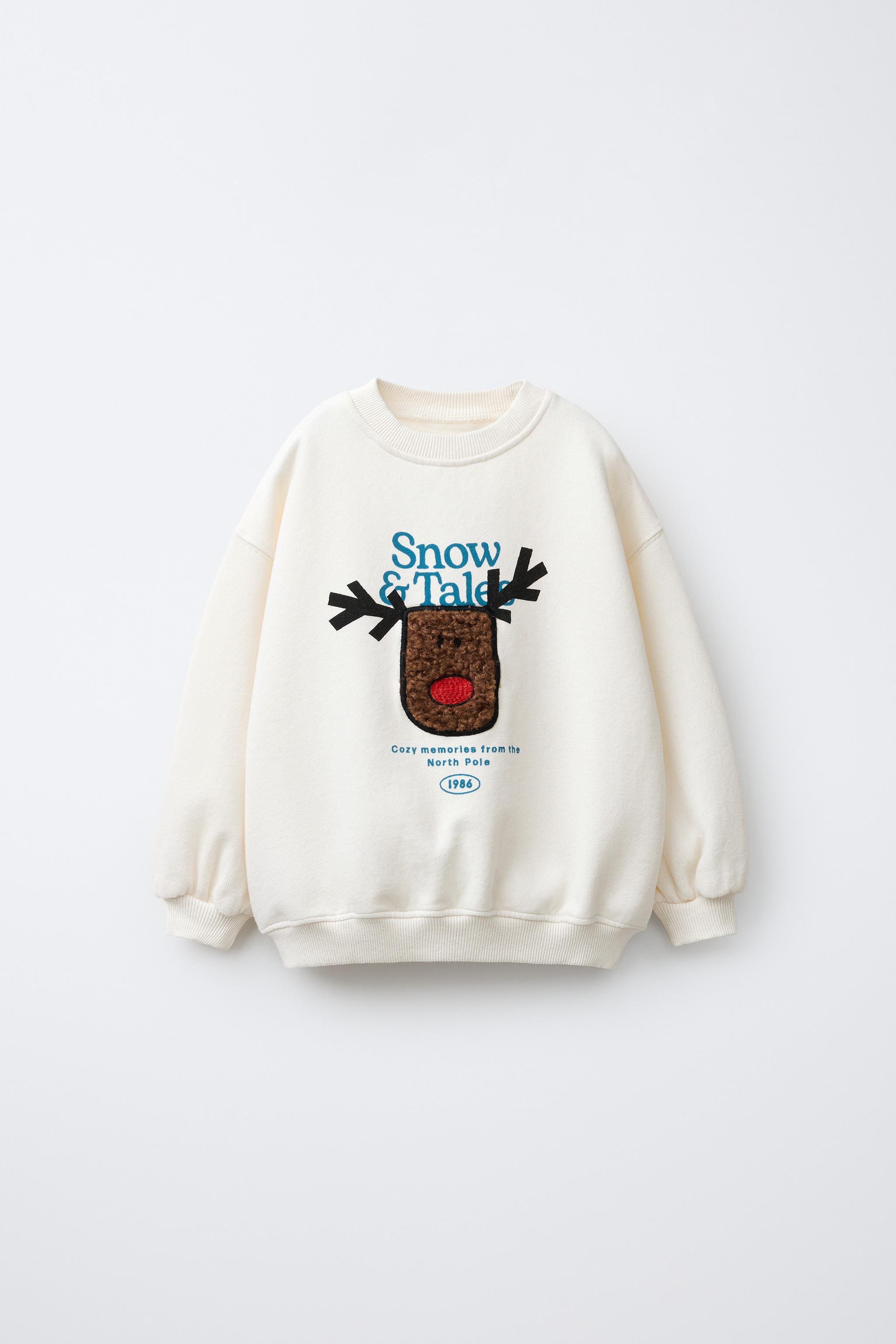 FAUX SHEARLING REINDEER PATCH SWEATSHIRT