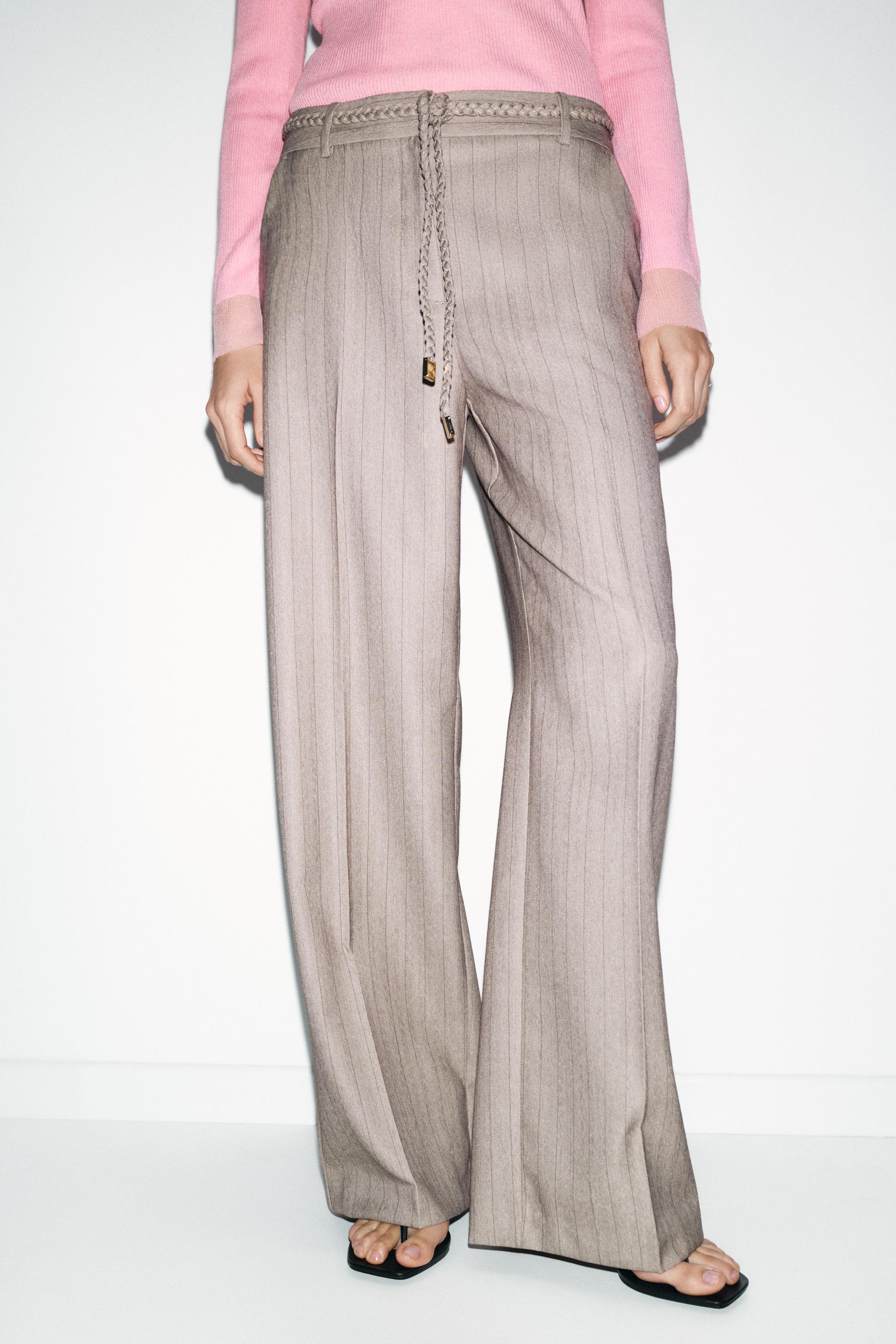 PANTALON CHEVRON AVEC CEINTURE TRESSÉE