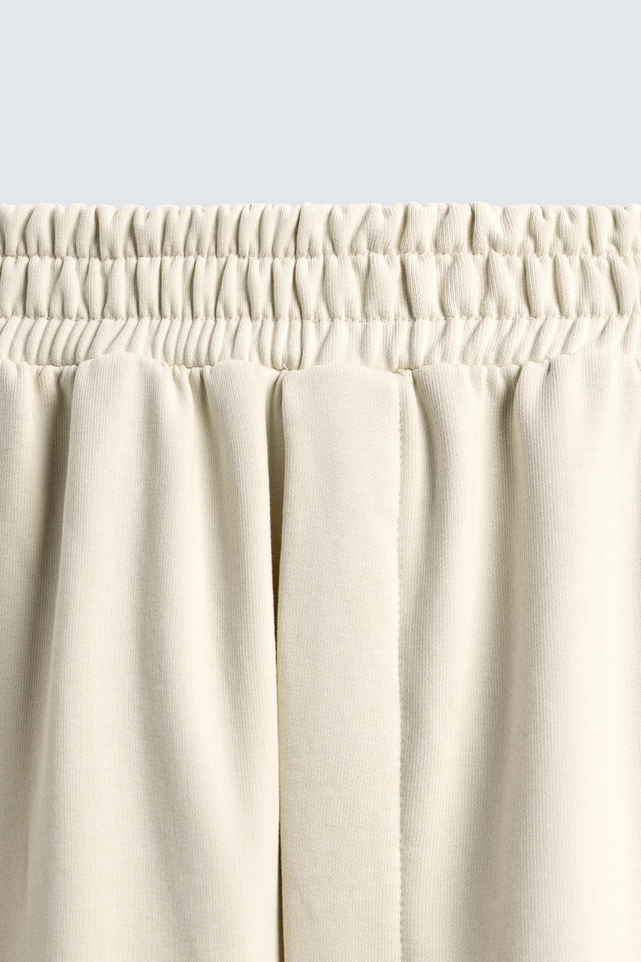 WIDE FIT JOGGER PANTS WITH STRIPES