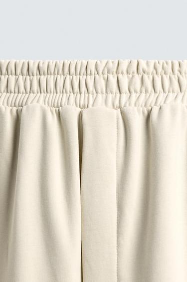 PANTALON DE JOGGING COUPE LARGE AVEC BANDES - Blanc ivoire de Zara - Image 8