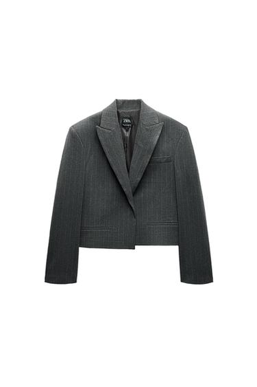 Front view of dark gray blazer with lapels and front pockets.