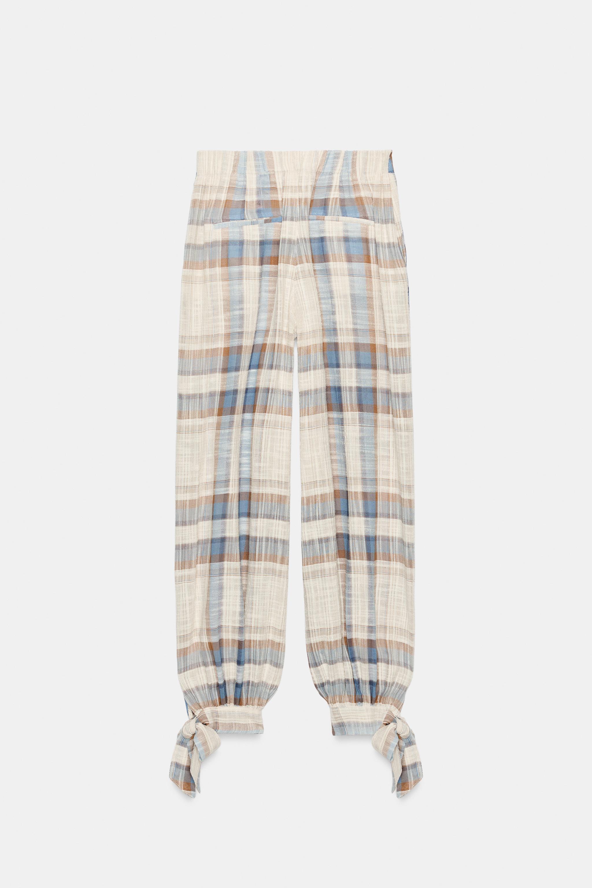 PANTALON BOUFFANT À LACETS ET CARREAUX