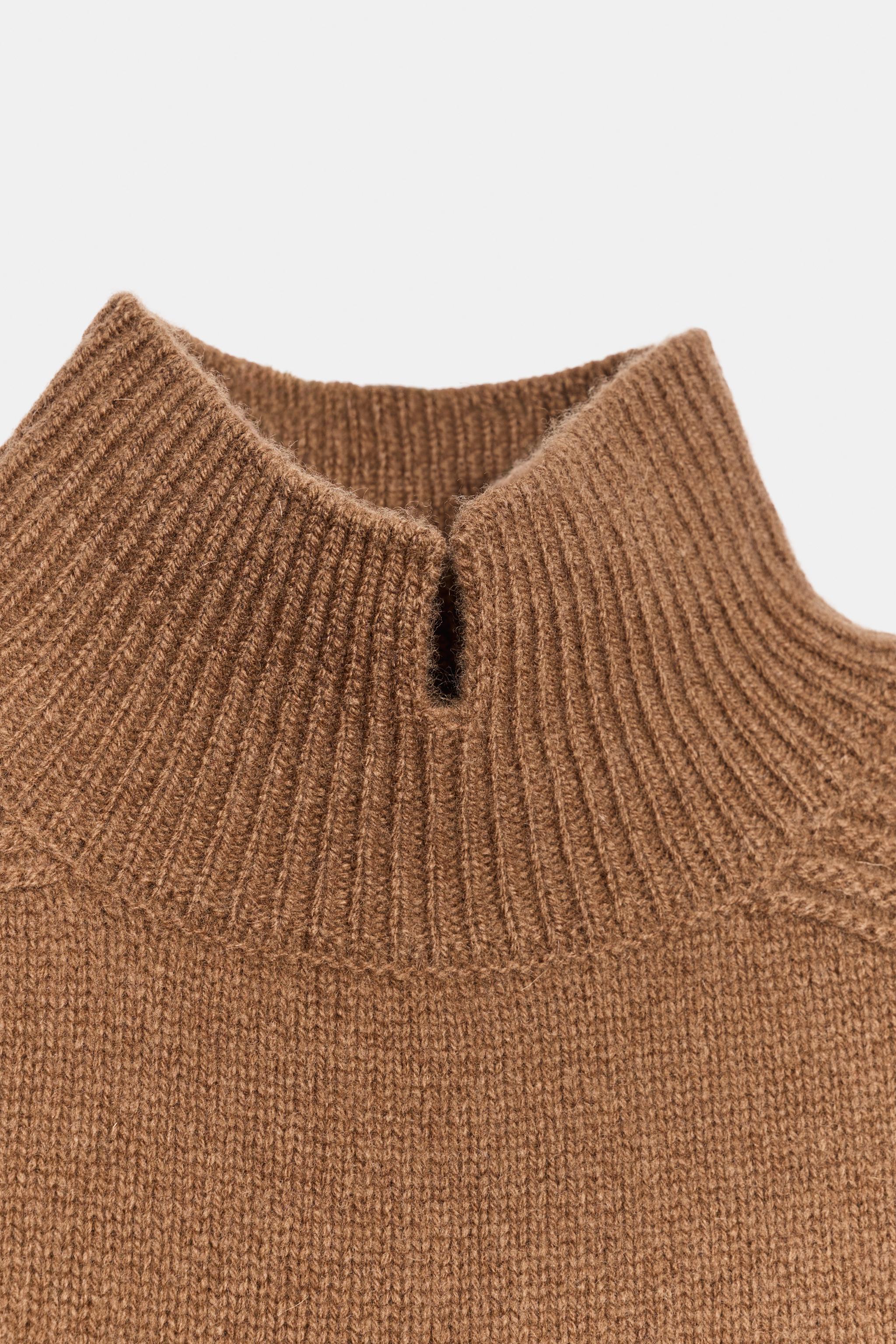 100% WOOL SHORT SLEEVE SWEATER