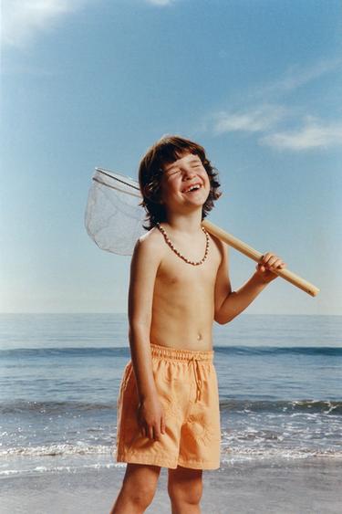 6-14 AÑOS/ BERMUDA BAÑO SOLES BORDADOS - Naranja de Zara