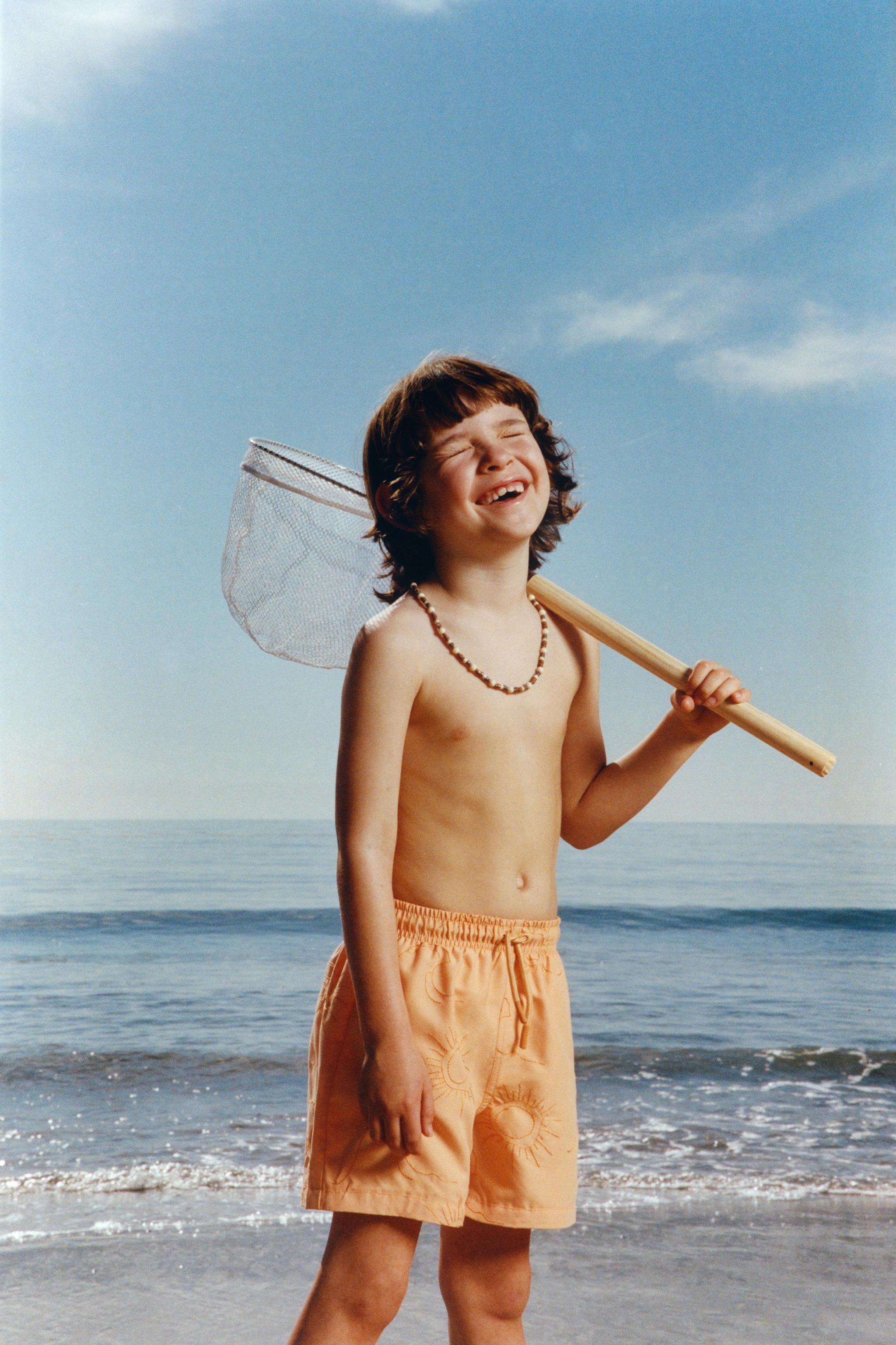 6-14 ANS/ SHORT DE BAIN SOLEILS BRODÉS